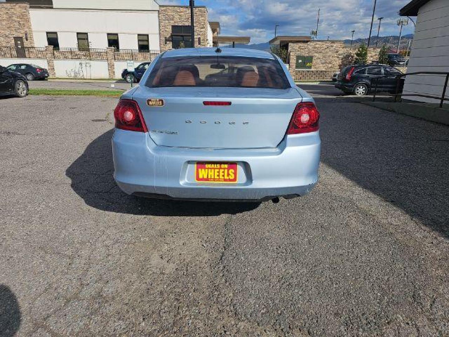 2013 Dodge Avenger Base (1C3CDZAB0DN) with an 2.4L L4 DOHC 16V engine, 4-Speed Automatic transmission, located at 4047 Montana Ave., Billings, MT, 59101, 45.770847, -108.529800 - Photo#4