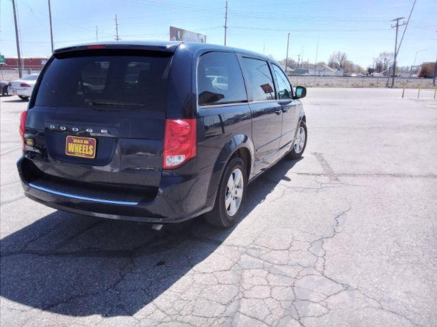 2013 Blue Streak Pearl Dodge Grand Caravan SE (2C4RDGBG5DR) with an 3.6L V6 DOHC 24V engine, 6-Speed Automatic transmission, located at 4047 Montana Ave., Billings, MT, 59101, 45.770847, -108.529800 - Photo#4