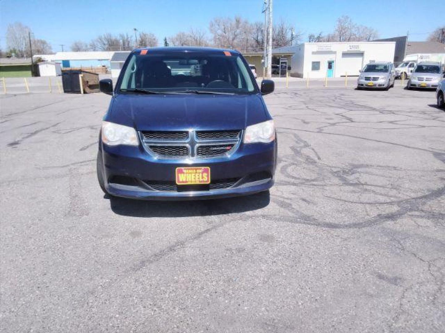 2013 Blue Streak Pearl Dodge Grand Caravan SE (2C4RDGBG5DR) with an 3.6L V6 DOHC 24V engine, 6-Speed Automatic transmission, located at 4047 Montana Ave., Billings, MT, 59101, 45.770847, -108.529800 - Photo#7