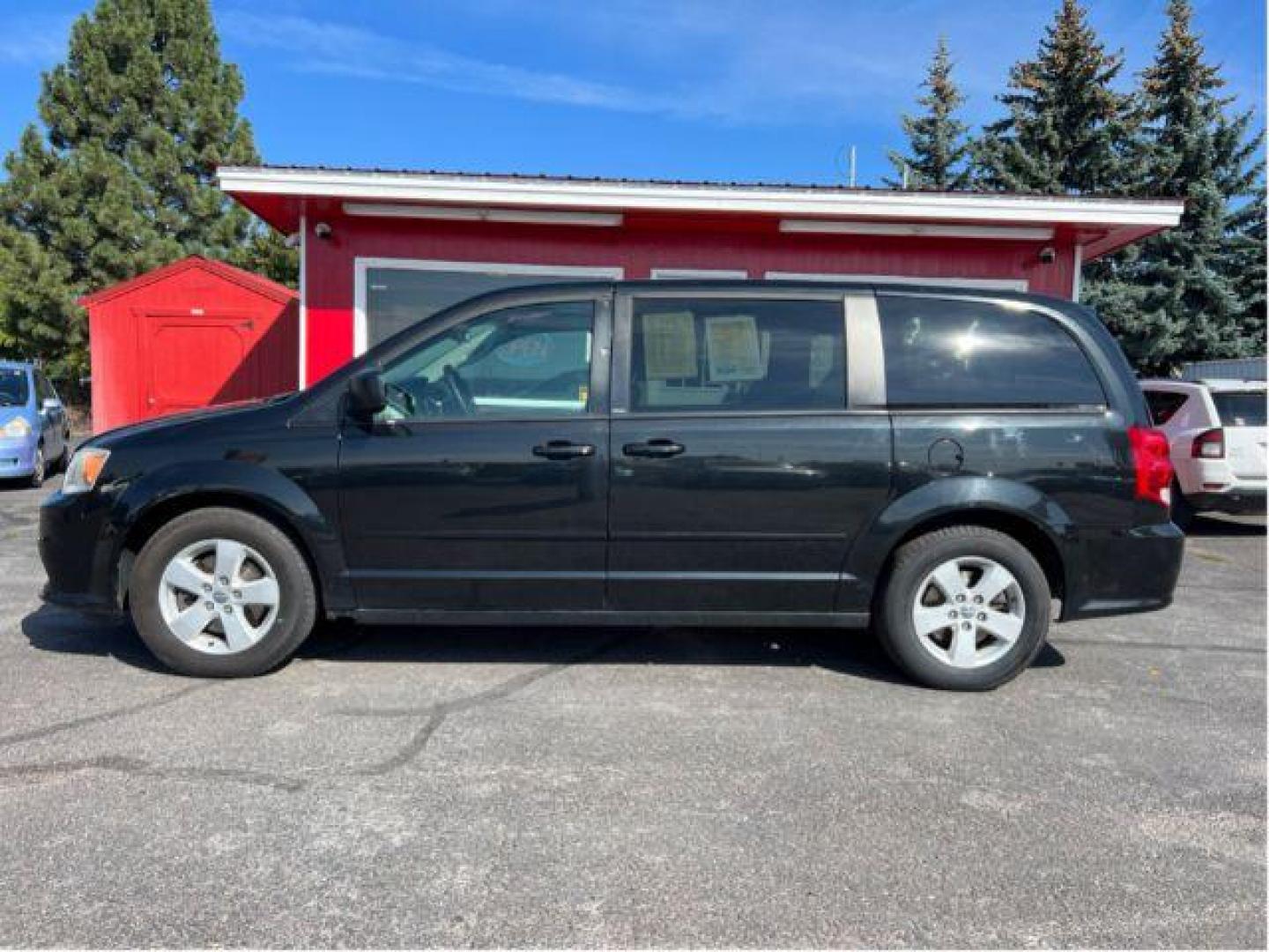 2013 Dodge Grand Caravan SE (2C4RDGBG5DR) with an 3.6L V6 DOHC 24V engine, 6-Speed Automatic transmission, located at 1800 West Broadway, Missoula, 59808, (406) 543-1986, 46.881348, -114.023628 - Photo#1