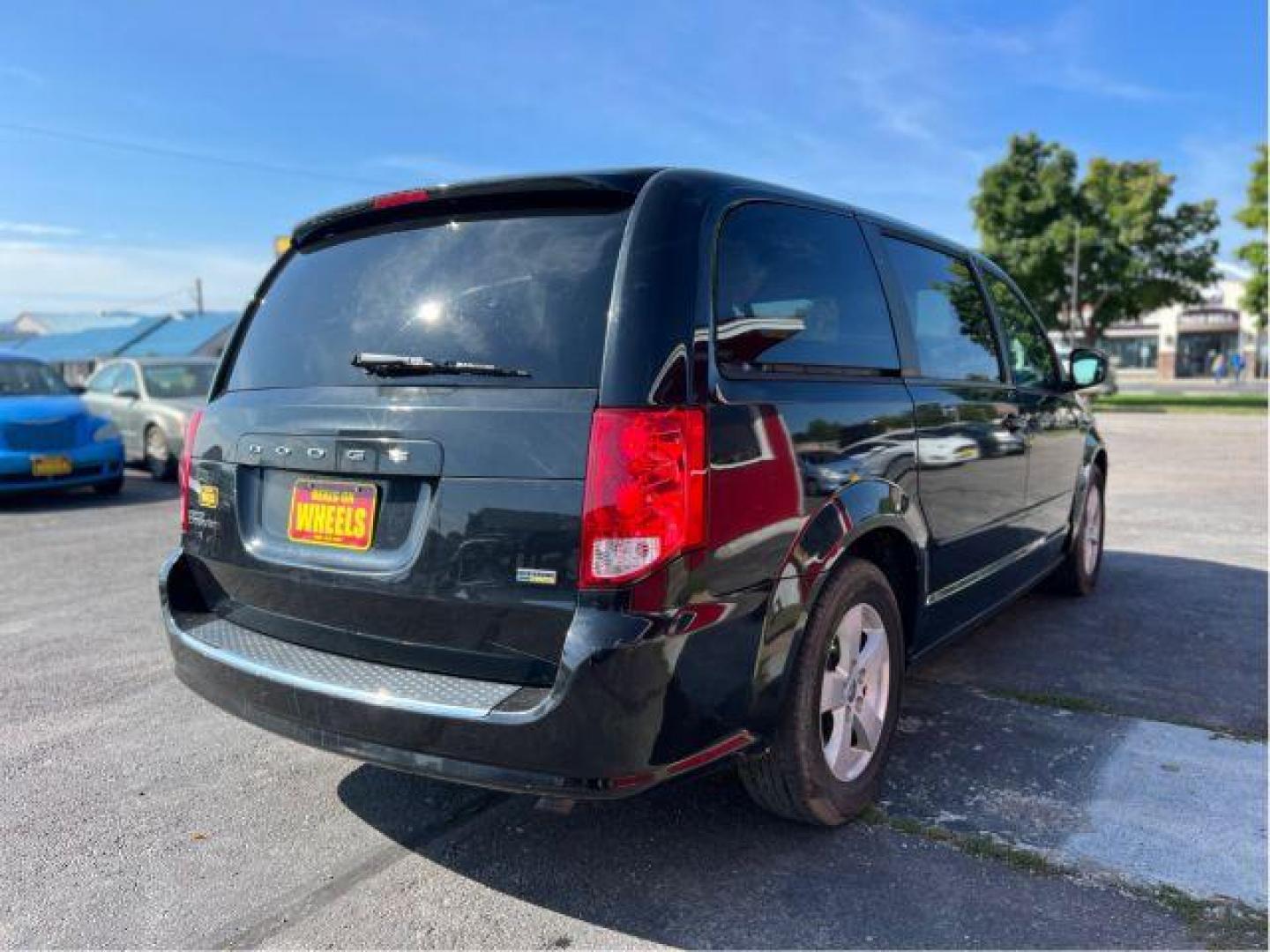 2013 Dodge Grand Caravan SE (2C4RDGBG5DR) with an 3.6L V6 DOHC 24V engine, 6-Speed Automatic transmission, located at 1800 West Broadway, Missoula, 59808, (406) 543-1986, 46.881348, -114.023628 - Photo#4