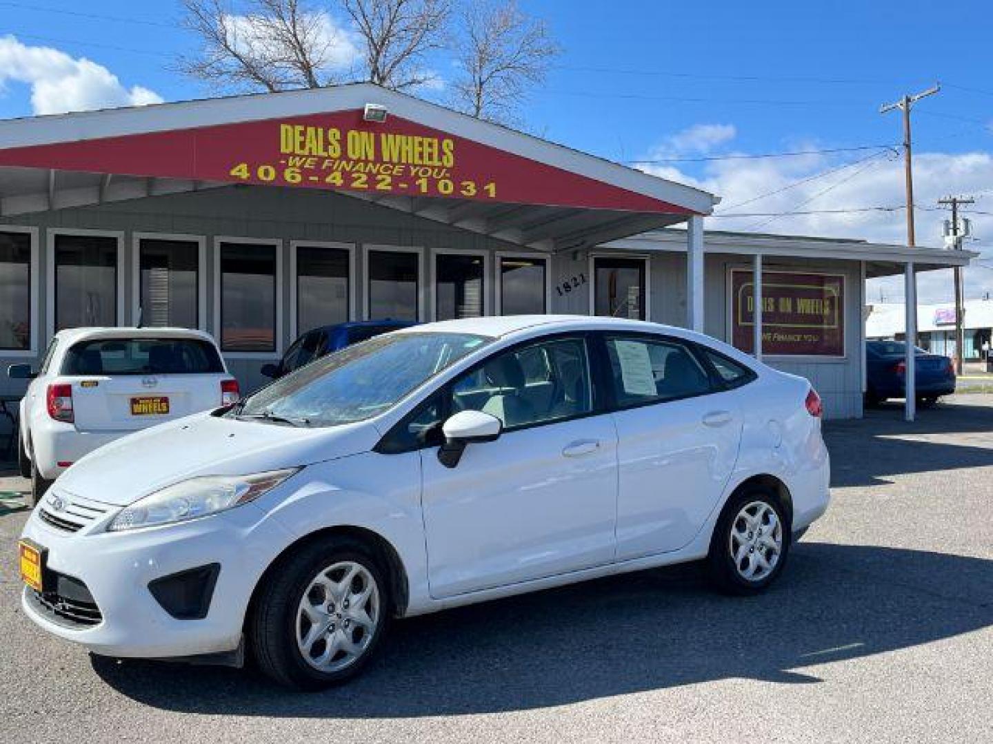 2013 Ford Fiesta S Sedan (3FADP4AJXDM) with an 1.6L L4 DOHC 16V engine, located at 1821 N Montana Ave., Helena, MT, 59601, 46.603447, -112.022781 - Photo#0