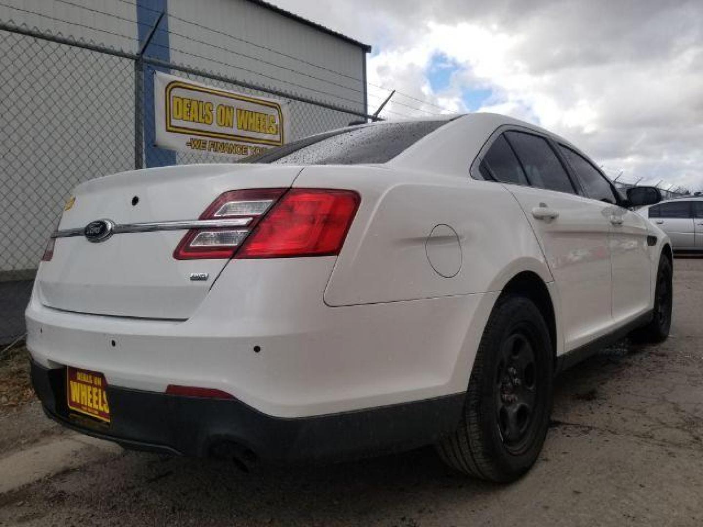 2013 Ford Taurus Police AWD (1FAHP2M87DG) with an 3.5L V6 DOHC 24V engine, 6-Speed Automatic transmission, located at 4801 10th Ave S,, Great Falls, MT, 59405, 47.494347, -111.229942 - Photo#4