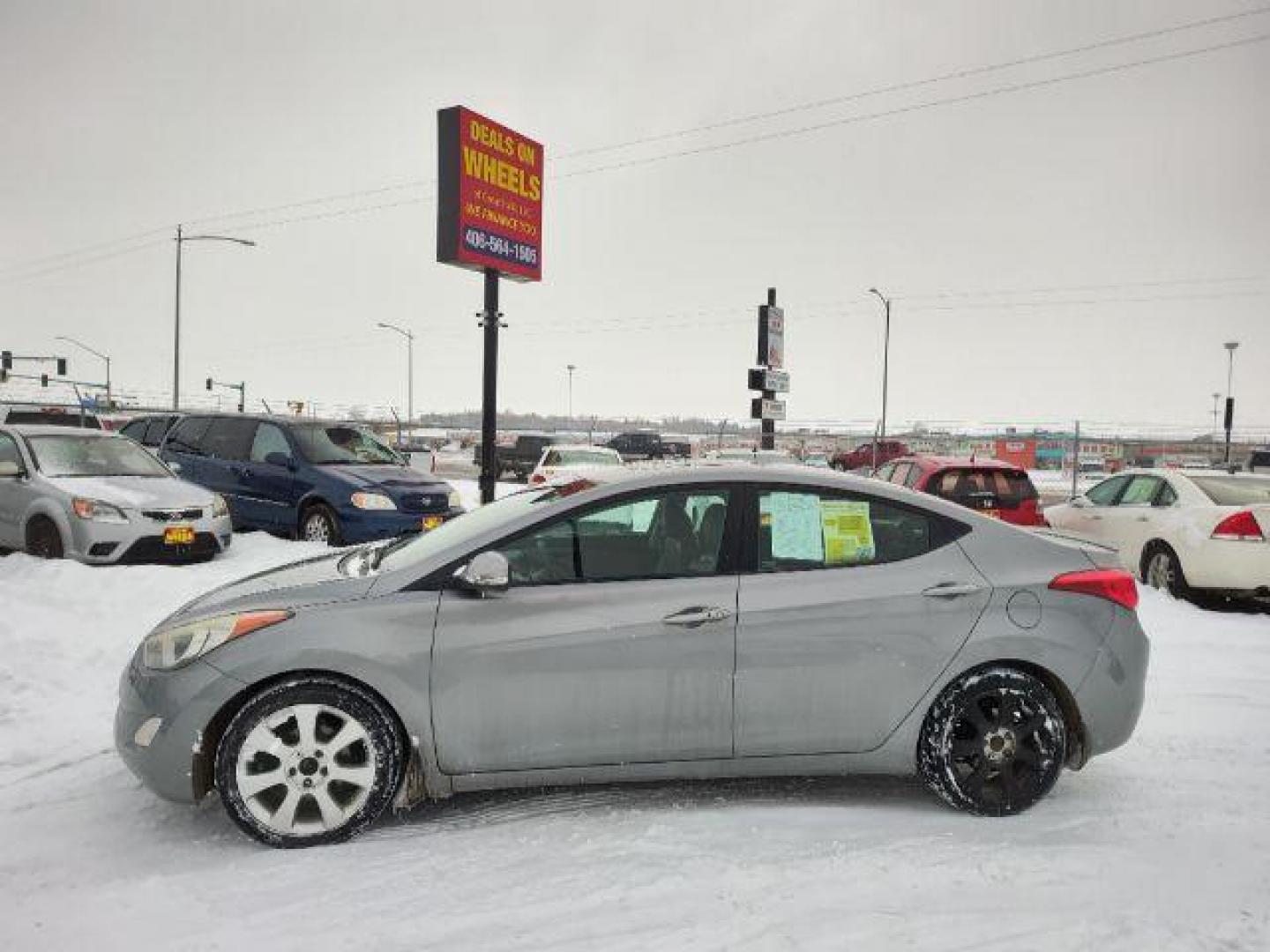 2013 Hyundai Elantra GLS A/T (KMHDH4AEXDU) with an 1.8L L4 DOHC 16V engine, 6-Speed Automatic transmission, located at 4801 10th Ave S,, Great Falls, MT, 59405, 47.494347, -111.229942 - Photo#1