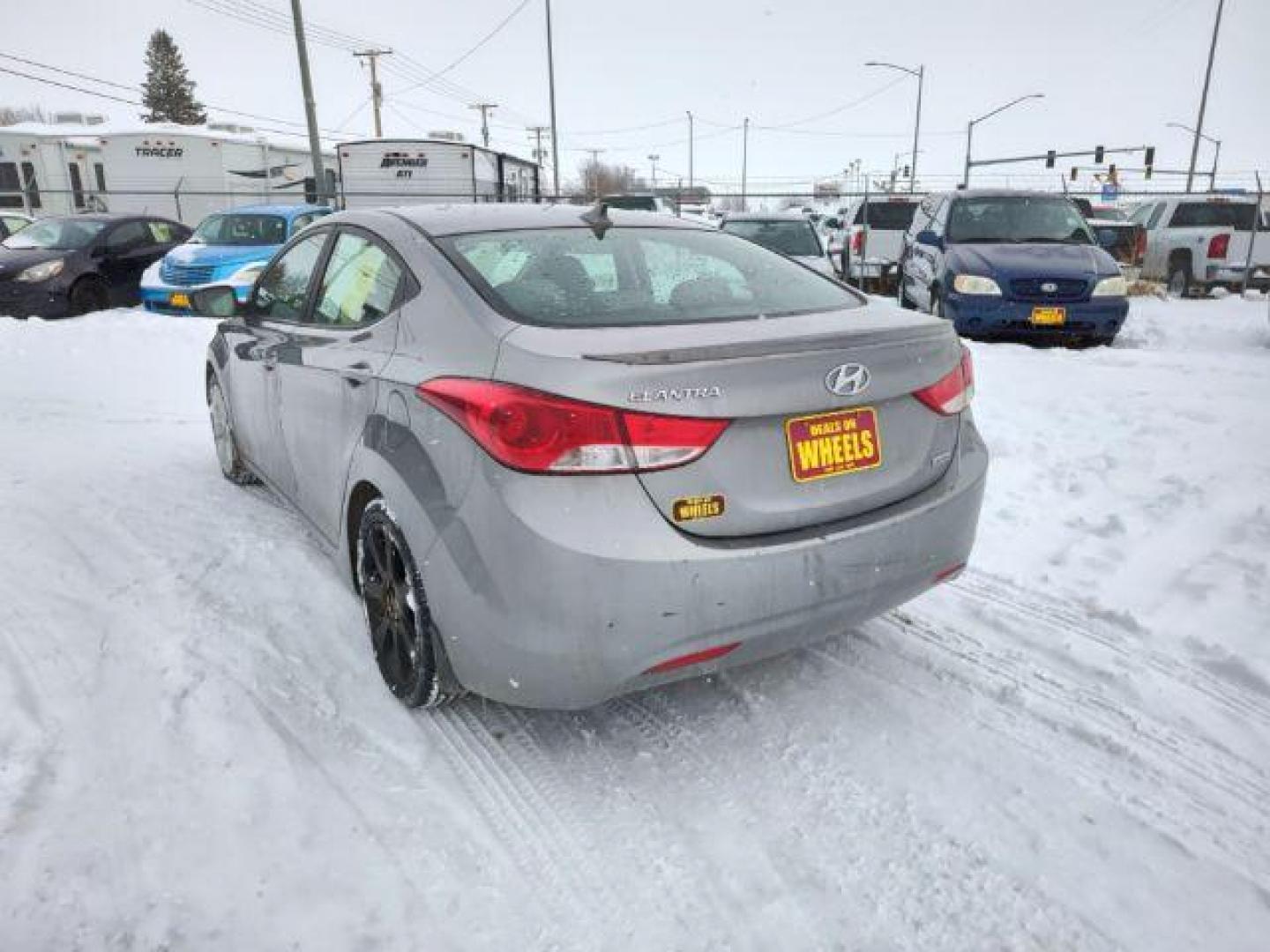 2013 Hyundai Elantra GLS A/T (KMHDH4AEXDU) with an 1.8L L4 DOHC 16V engine, 6-Speed Automatic transmission, located at 4801 10th Ave S,, Great Falls, MT, 59405, 47.494347, -111.229942 - Photo#2