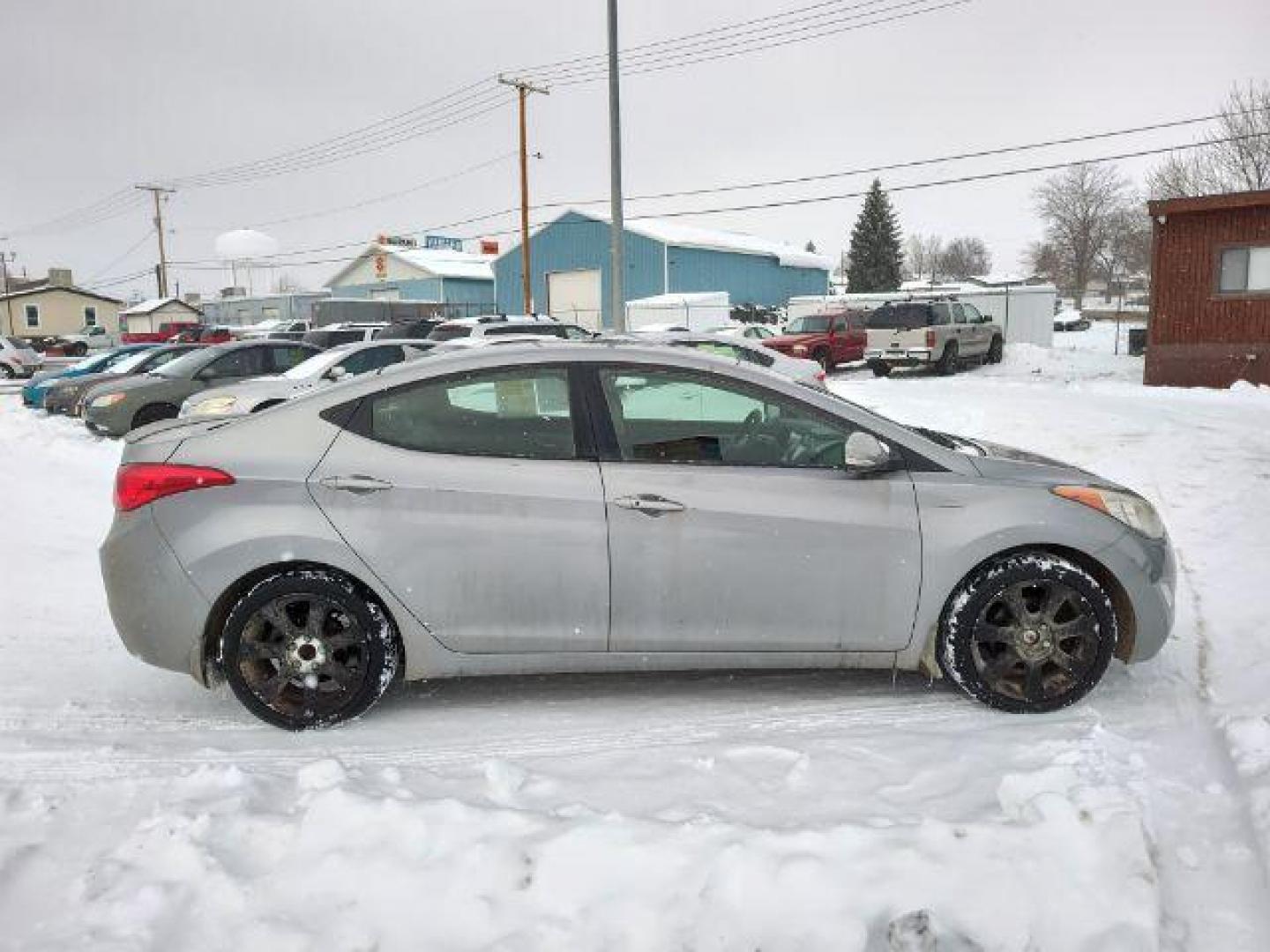 2013 Hyundai Elantra GLS A/T (KMHDH4AEXDU) with an 1.8L L4 DOHC 16V engine, 6-Speed Automatic transmission, located at 4801 10th Ave S,, Great Falls, MT, 59405, 47.494347, -111.229942 - Photo#5