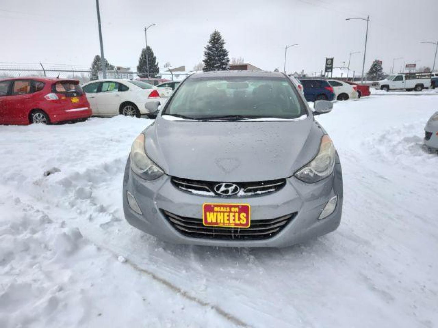 2013 Hyundai Elantra GLS A/T (KMHDH4AEXDU) with an 1.8L L4 DOHC 16V engine, 6-Speed Automatic transmission, located at 4801 10th Ave S,, Great Falls, MT, 59405, 47.494347, -111.229942 - Photo#7