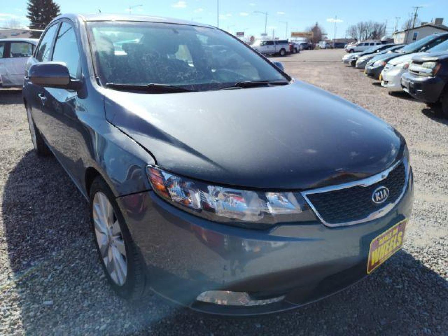 2013 Kia Forte SX (KNAFW4A39D5) with an 2.4L L4 DOHC 16V engine, located at 4801 10th Ave S,, Great Falls, MT, 59405, 47.494347, -111.229942 - Photo#6