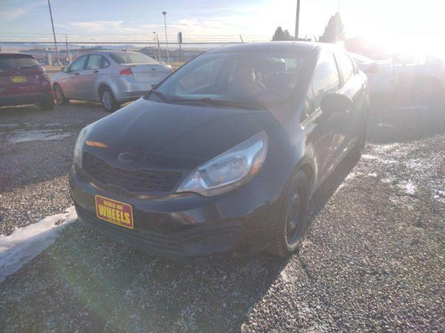 2013 Aurora Black Pearl Kia Rio LX (KNADM4A33D6) with an 1.6L L4 DOHC 16V engine, located at 4801 10th Ave S,, Great Falls, MT, 59405, 47.494347, -111.229942 - Photo#0