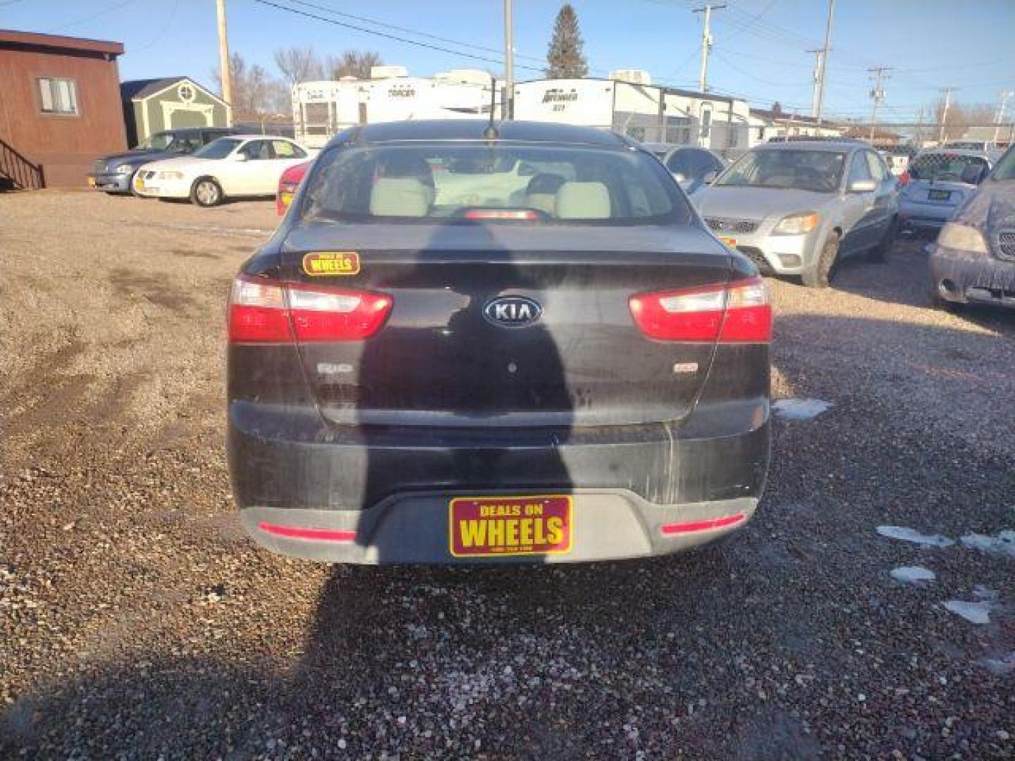 2013 Aurora Black Pearl Kia Rio LX (KNADM4A33D6) with an 1.6L L4 DOHC 16V engine, located at 4801 10th Ave S,, Great Falls, MT, 59405, 47.494347, -111.229942 - Photo#3