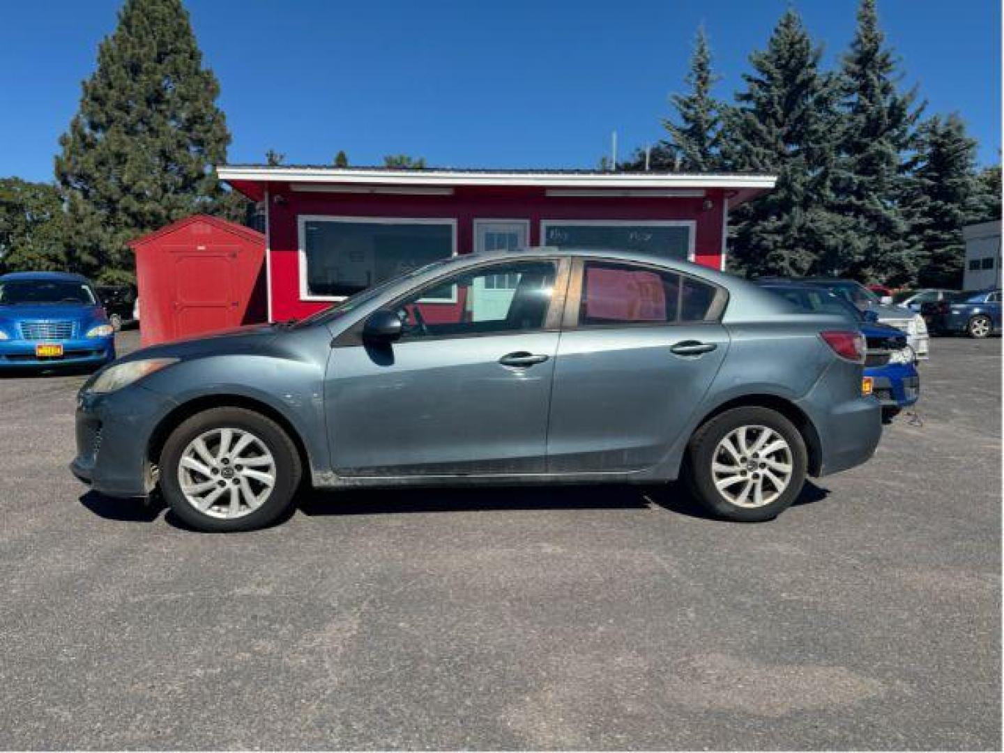 2013 Mazda MAZDA3 i SV MT 4-Door (JM1BL1TGXD1) with an 2.0L L4 DOHC 16V engine, 5-Speed Manual transmission, located at 601 E. Idaho St., Kalispell, MT, 59901, 48.203983, -114.308662 - Photo#1