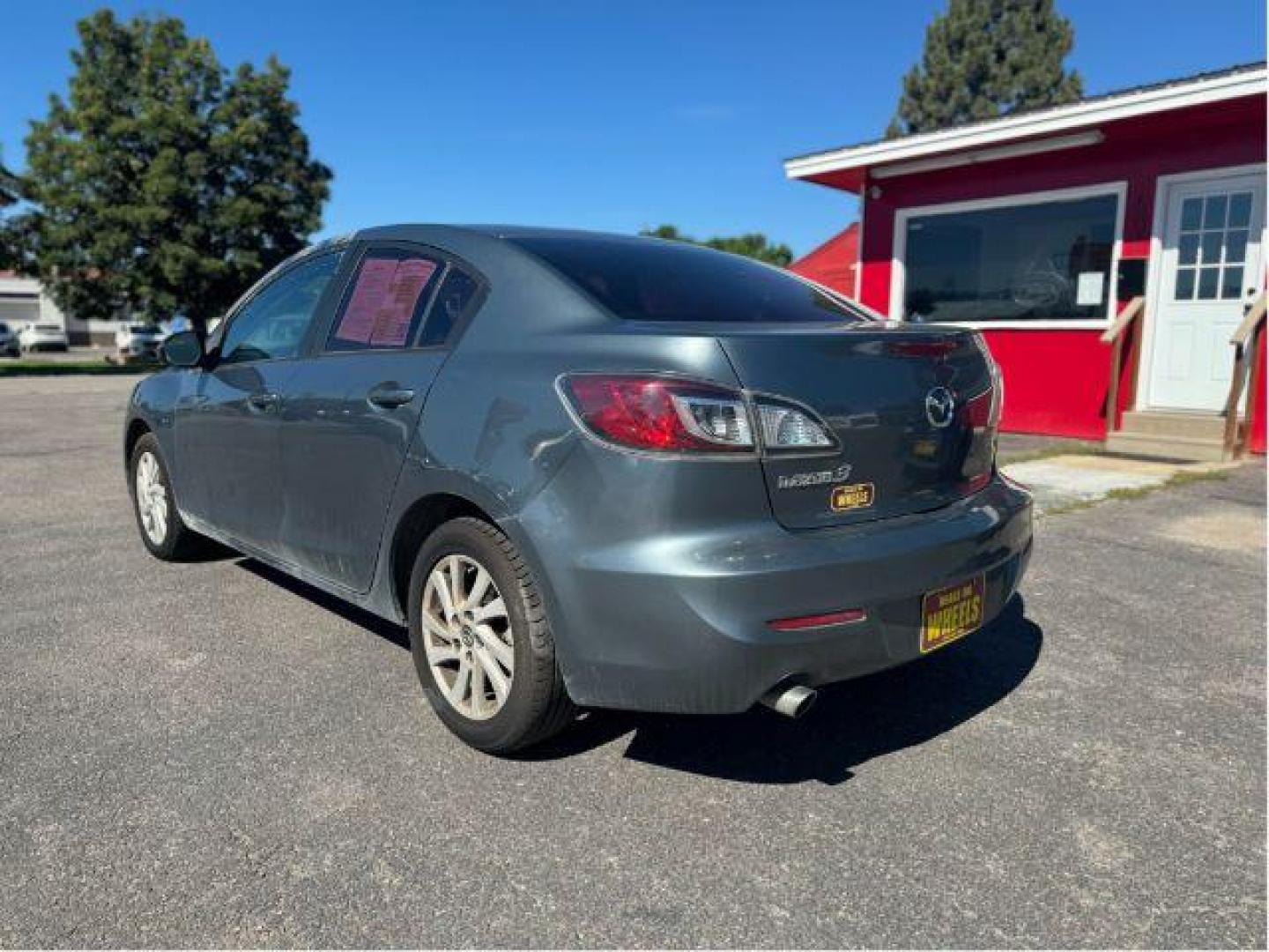 2013 Mazda MAZDA3 i SV MT 4-Door (JM1BL1TGXD1) with an 2.0L L4 DOHC 16V engine, 5-Speed Manual transmission, located at 601 E. Idaho St., Kalispell, MT, 59901, 48.203983, -114.308662 - Photo#2