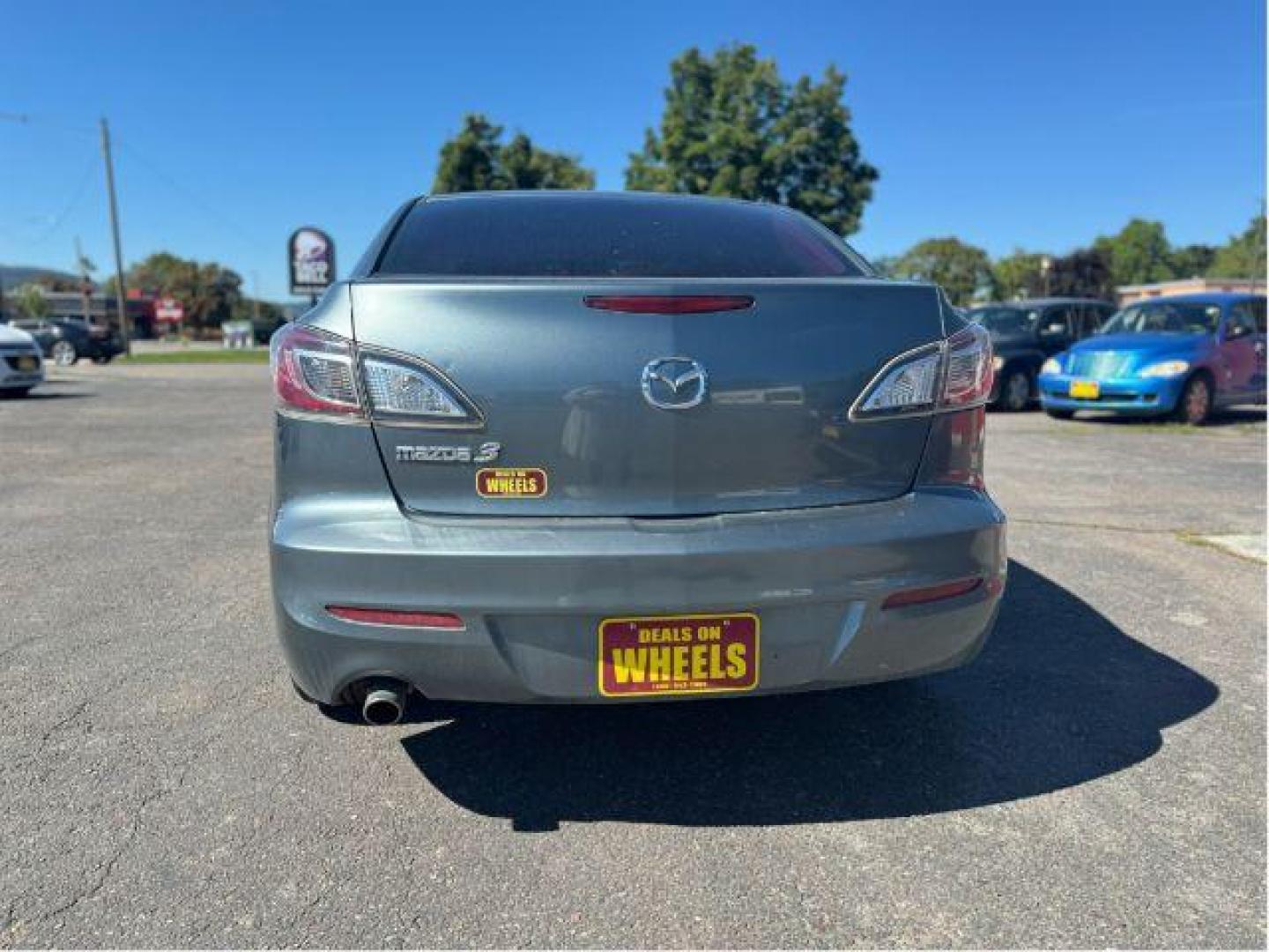 2013 Mazda MAZDA3 i SV MT 4-Door (JM1BL1TGXD1) with an 2.0L L4 DOHC 16V engine, 5-Speed Manual transmission, located at 601 E. Idaho St., Kalispell, MT, 59901, 48.203983, -114.308662 - Photo#3