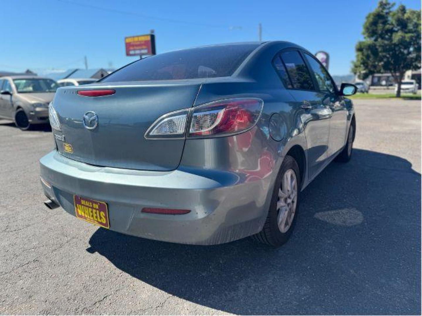 2013 Mazda MAZDA3 i SV MT 4-Door (JM1BL1TGXD1) with an 2.0L L4 DOHC 16V engine, 5-Speed Manual transmission, located at 601 E. Idaho St., Kalispell, MT, 59901, 48.203983, -114.308662 - Photo#4