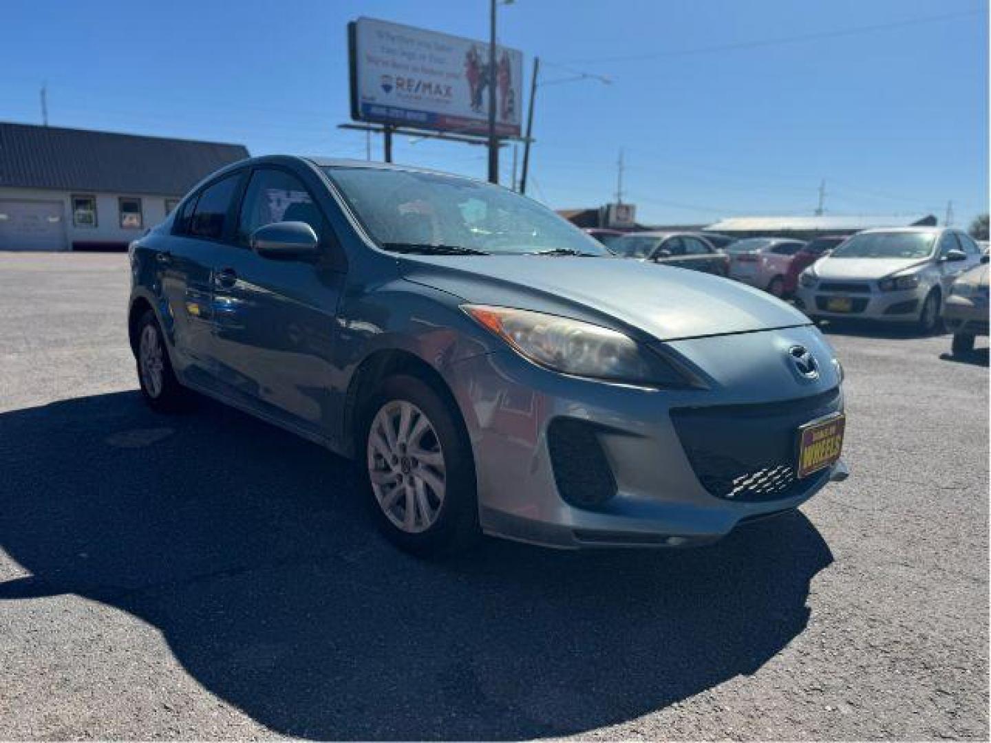 2013 Mazda MAZDA3 i SV MT 4-Door (JM1BL1TGXD1) with an 2.0L L4 DOHC 16V engine, 5-Speed Manual transmission, located at 601 E. Idaho St., Kalispell, MT, 59901, 48.203983, -114.308662 - Photo#6