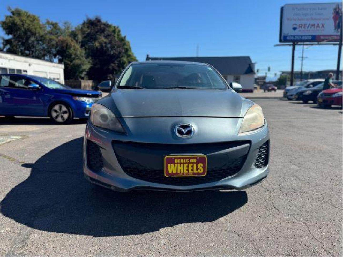 2013 Mazda MAZDA3 i SV MT 4-Door (JM1BL1TGXD1) with an 2.0L L4 DOHC 16V engine, 5-Speed Manual transmission, located at 601 E. Idaho St., Kalispell, MT, 59901, 48.203983, -114.308662 - Photo#7