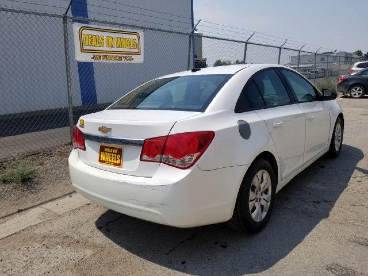 2014 Chevrolet Cruze LS Auto (1G1PA5SG6E7) with an 1.8L L4 DOHC 16V engine, 6-Speed Automatic transmission, located at 4801 10th Ave S,, Great Falls, MT, 59405, 47.494347, -111.229942 - Photo#4