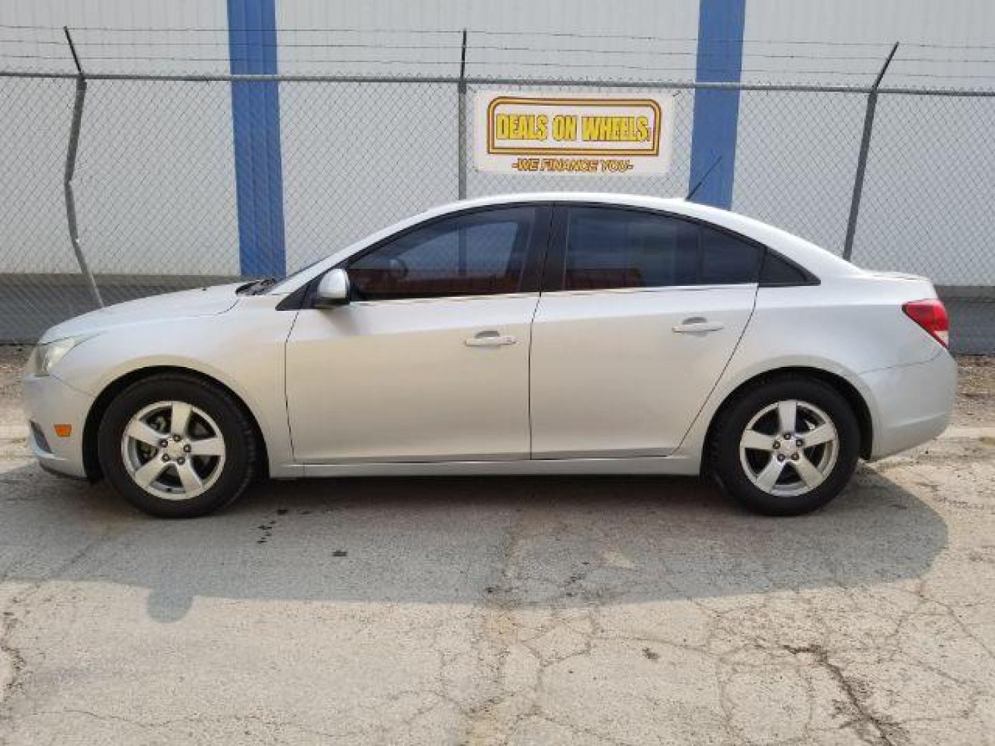 2014 Chevrolet Cruze SEDAN 4-DR (1G1PC5SB0E7) with an 1.4L L4 DOHC 16V TURBO engine, 6-Speed Automatic transmission, located at 4801 10th Ave S,, Great Falls, MT, 59405, 47.494347, -111.229942 - Photo#2