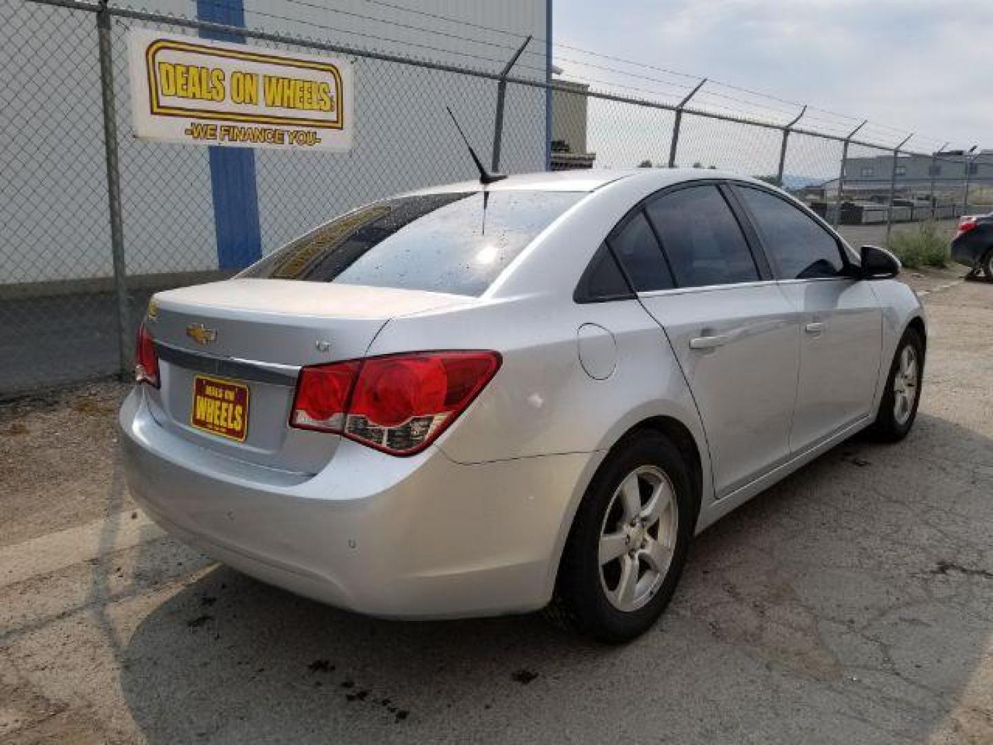 2014 Chevrolet Cruze SEDAN 4-DR (1G1PC5SB0E7) with an 1.4L L4 DOHC 16V TURBO engine, 6-Speed Automatic transmission, located at 4801 10th Ave S,, Great Falls, MT, 59405, 47.494347, -111.229942 - Photo#4