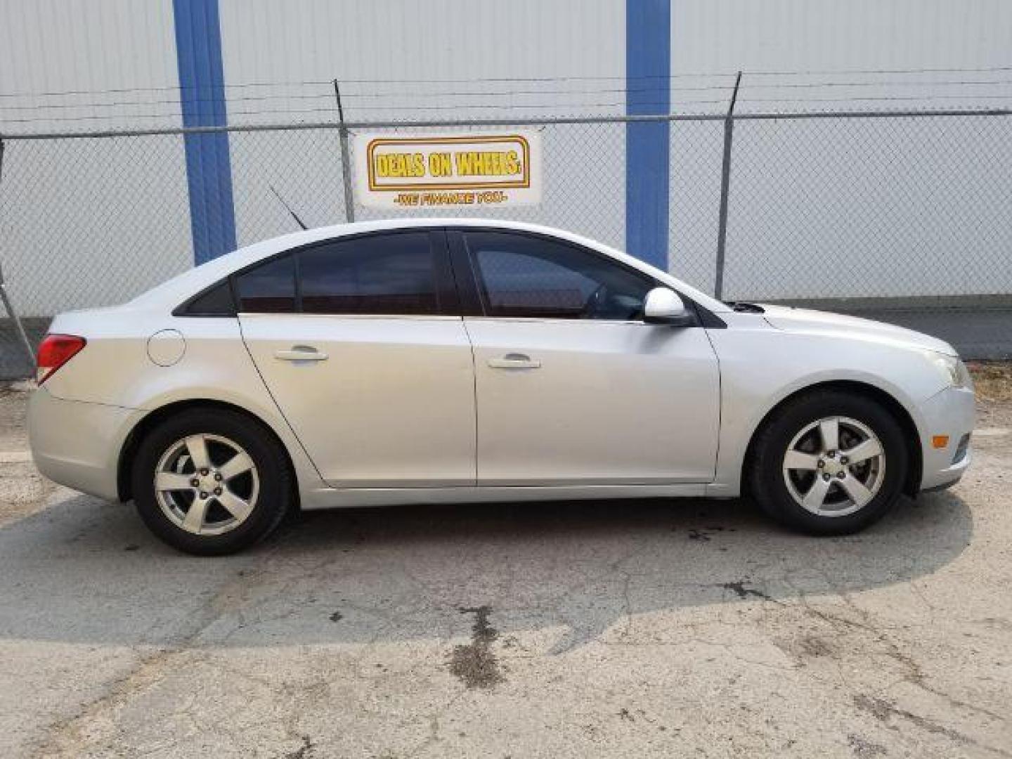 2014 Chevrolet Cruze SEDAN 4-DR (1G1PC5SB0E7) with an 1.4L L4 DOHC 16V TURBO engine, 6-Speed Automatic transmission, located at 4801 10th Ave S,, Great Falls, MT, 59405, 47.494347, -111.229942 - Photo#5