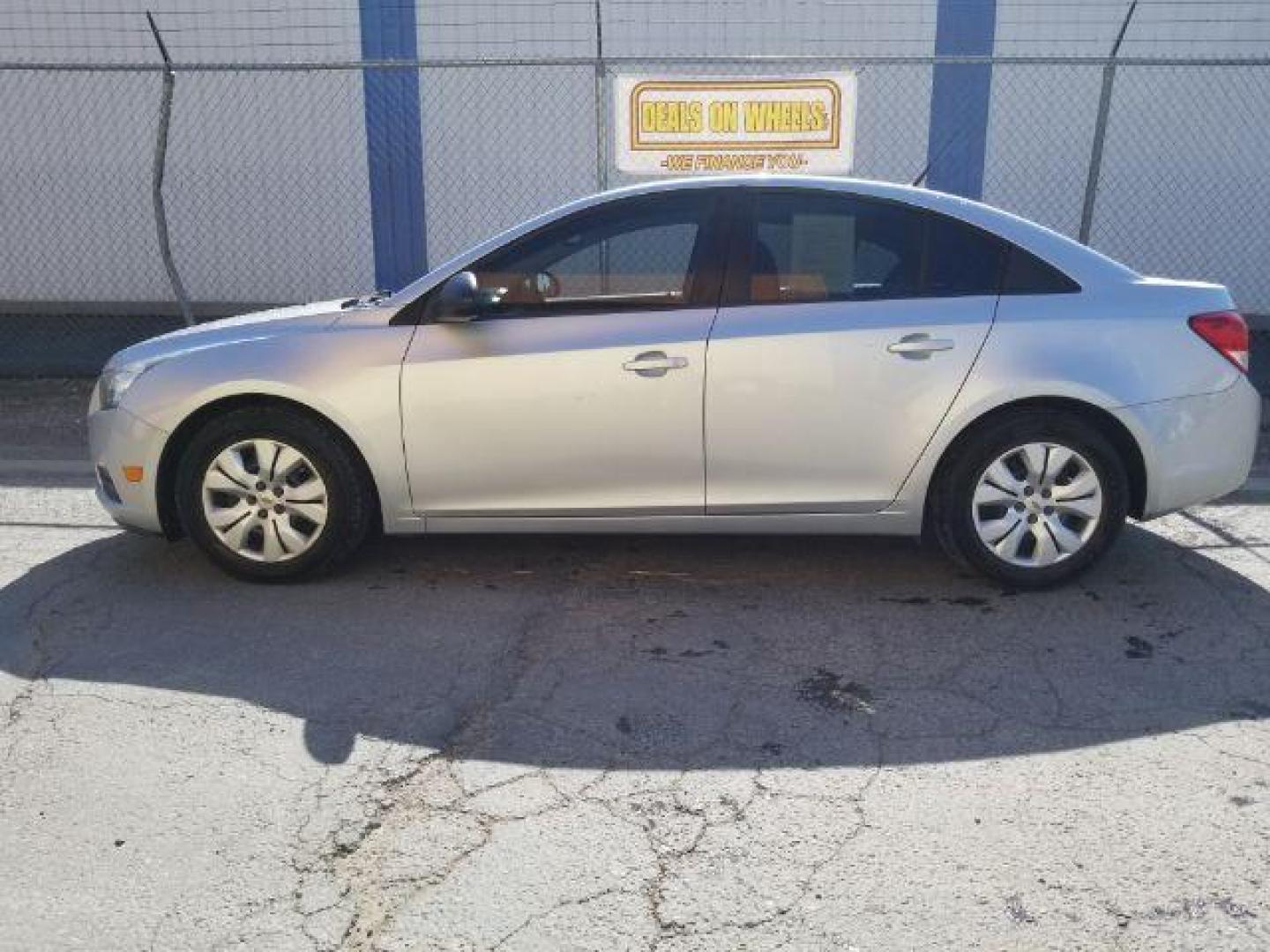 2014 Chevrolet Cruze LS Manual (1G1PB5SG4E7) with an 1.8L L4 DOHC 16V engine, 6-Speed Manual transmission, located at 4047 Montana Ave., Billings, MT, 59101, 45.770847, -108.529800 - Photo#2