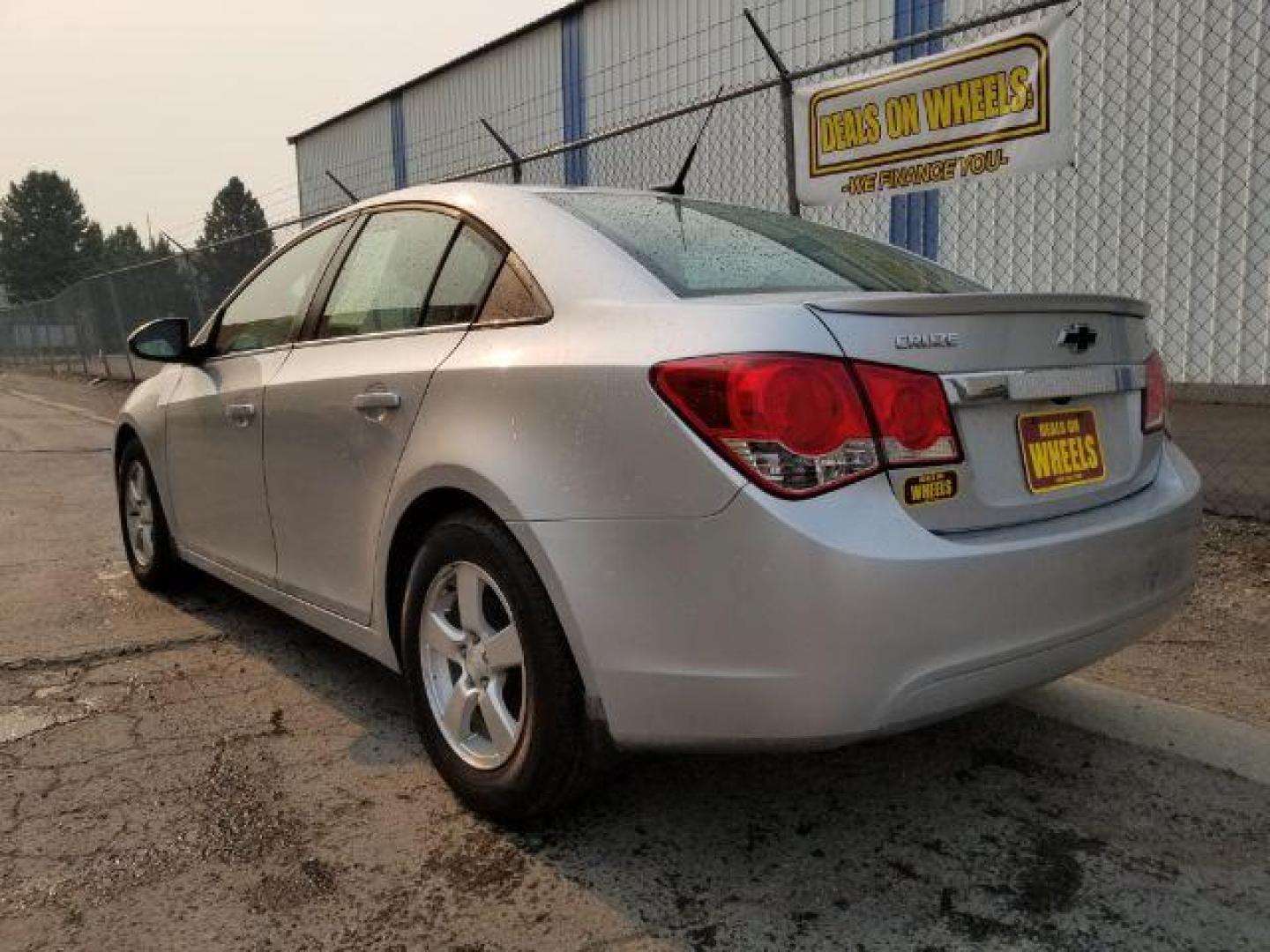 2014 Chevrolet Cruze 1LT Auto (1G1PC5SB8E7) with an 1.4L L4 DOHC 16V TURBO engine, 6-Speed Automatic transmission, located at 4801 10th Ave S,, Great Falls, MT, 59405, 47.494347, -111.229942 - Photo#3