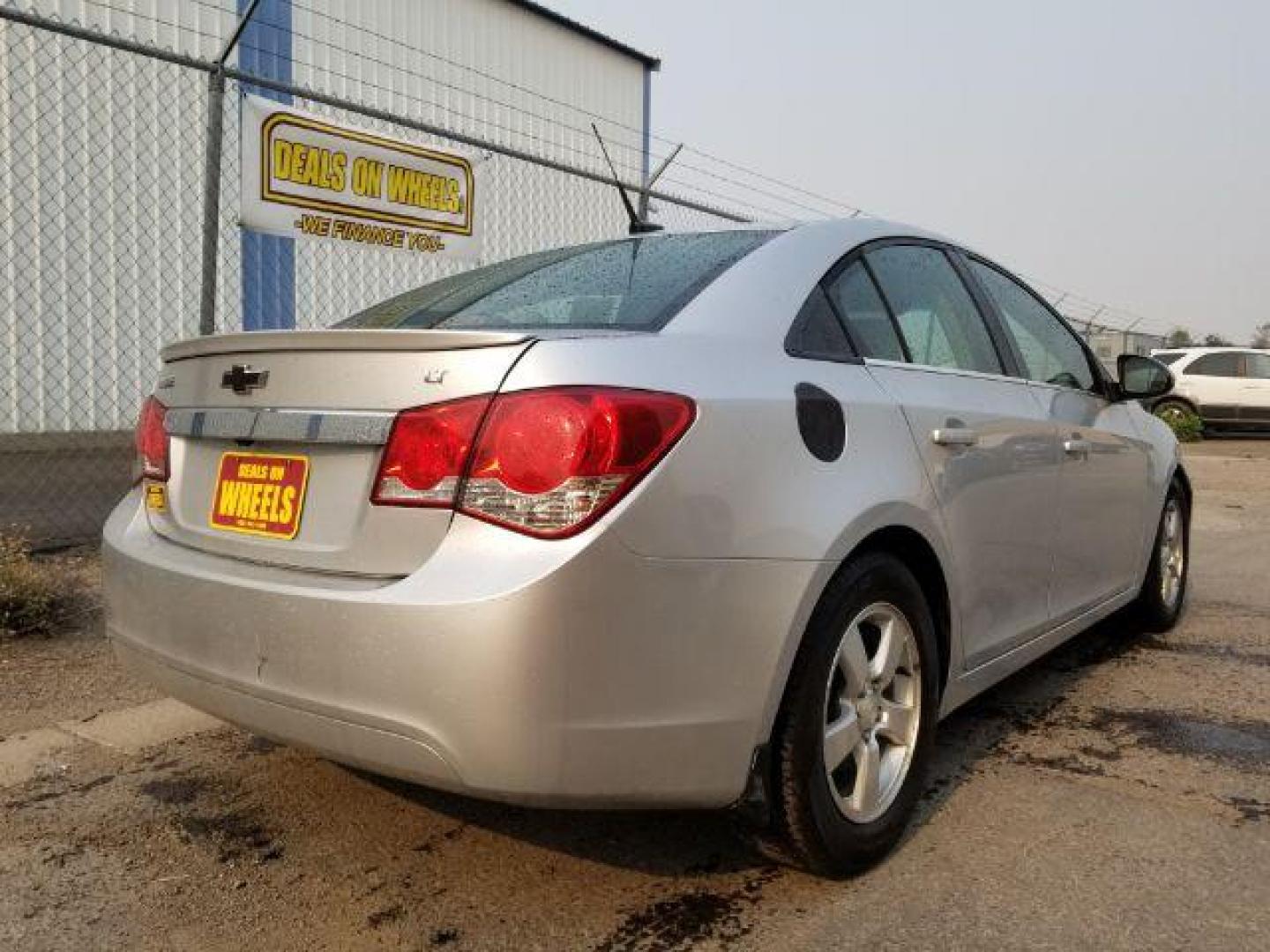 2014 Chevrolet Cruze 1LT Auto (1G1PC5SB8E7) with an 1.4L L4 DOHC 16V TURBO engine, 6-Speed Automatic transmission, located at 4801 10th Ave S,, Great Falls, MT, 59405, 47.494347, -111.229942 - Photo#4