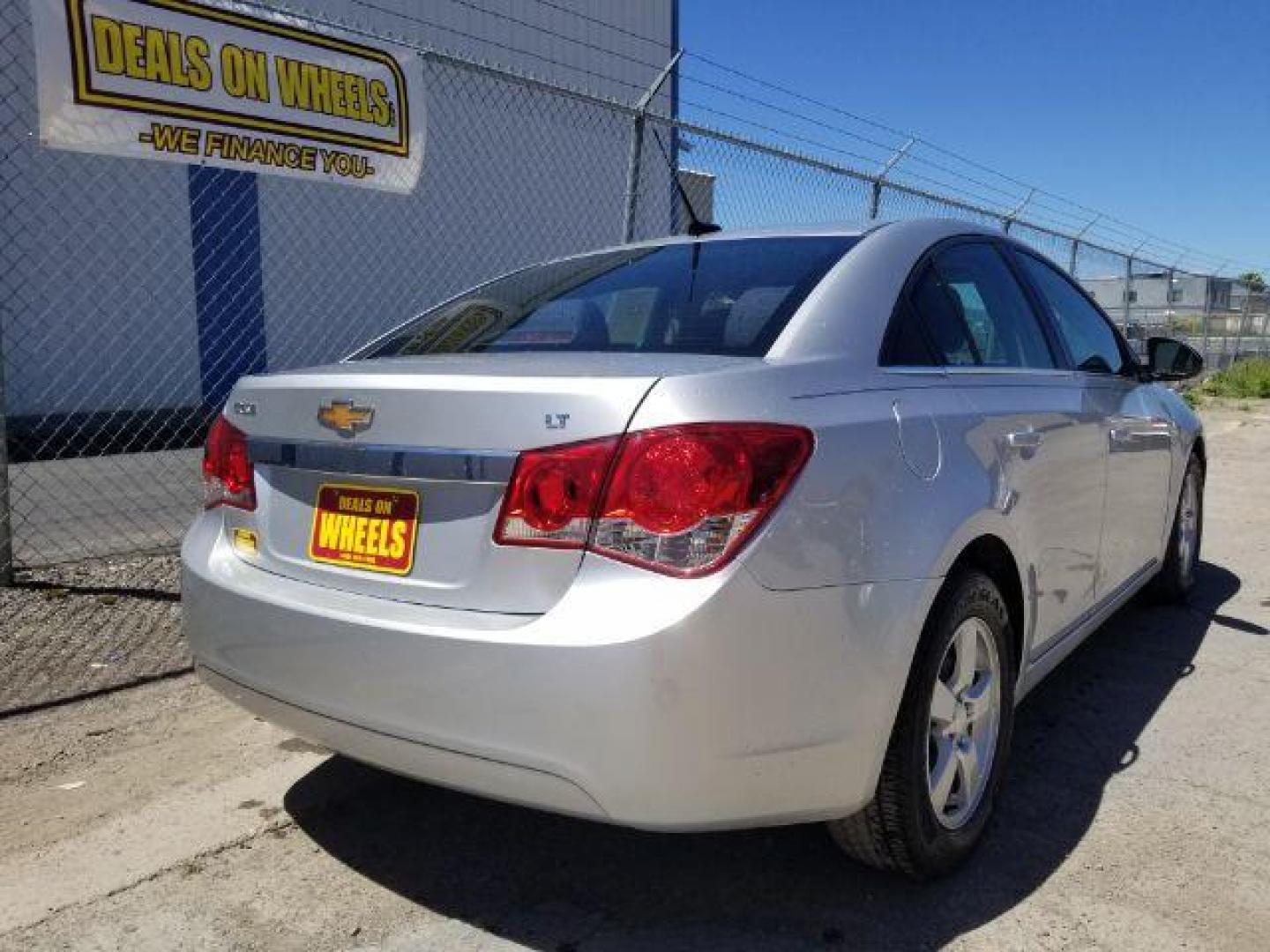 2014 Black Granite Metallic Chevrolet Cruze 1LT Auto (1G1PC5SB3E7) with an 1.4L L4 DOHC 16V TURBO engine, 6-Speed Automatic transmission, located at 1821 N Montana Ave., Helena, MT, 59601, 46.603447, -112.022781 - Photo#4