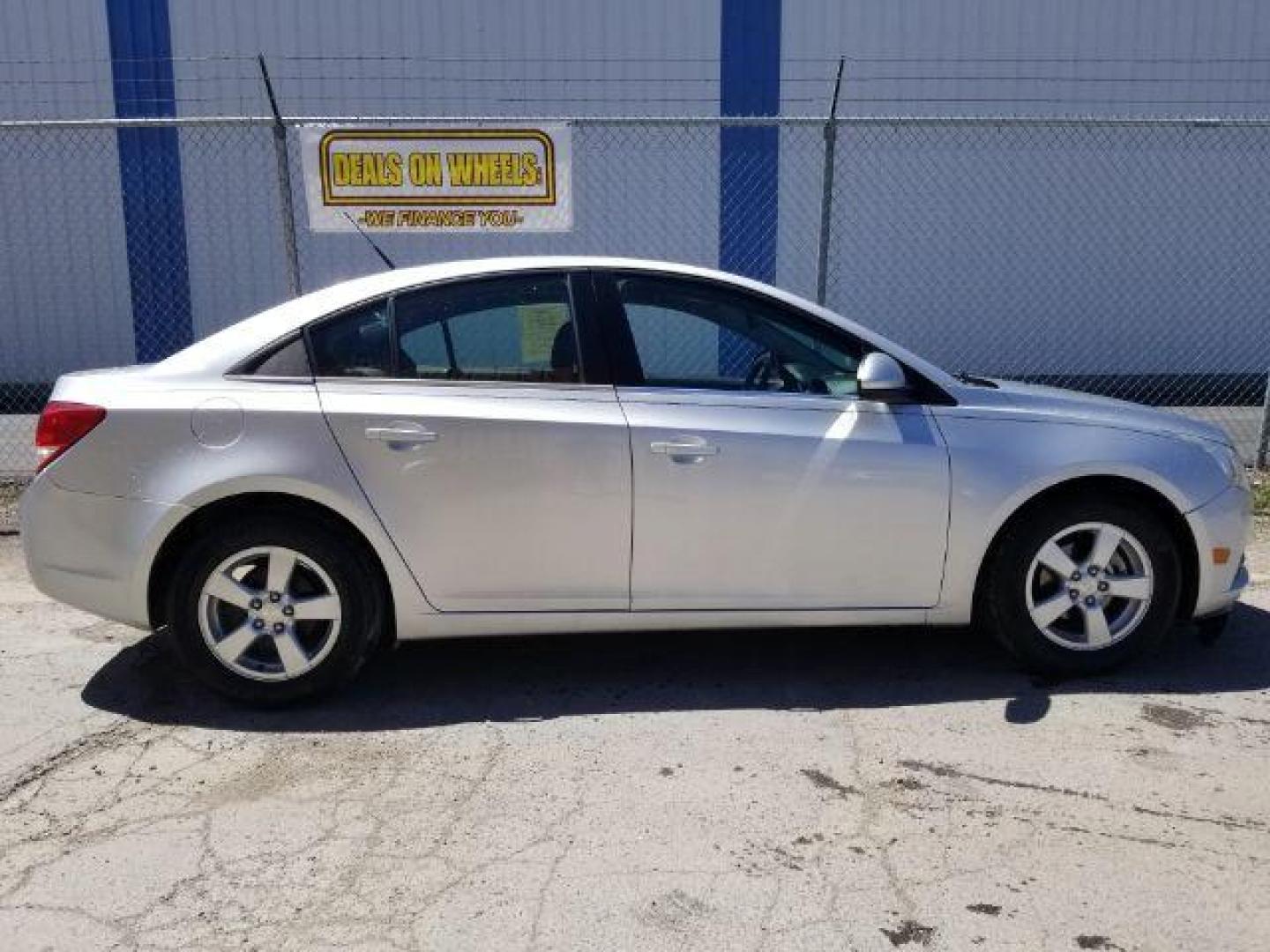 2014 Black Granite Metallic Chevrolet Cruze 1LT Auto (1G1PC5SB3E7) with an 1.4L L4 DOHC 16V TURBO engine, 6-Speed Automatic transmission, located at 1821 N Montana Ave., Helena, MT, 59601, 46.603447, -112.022781 - Photo#5