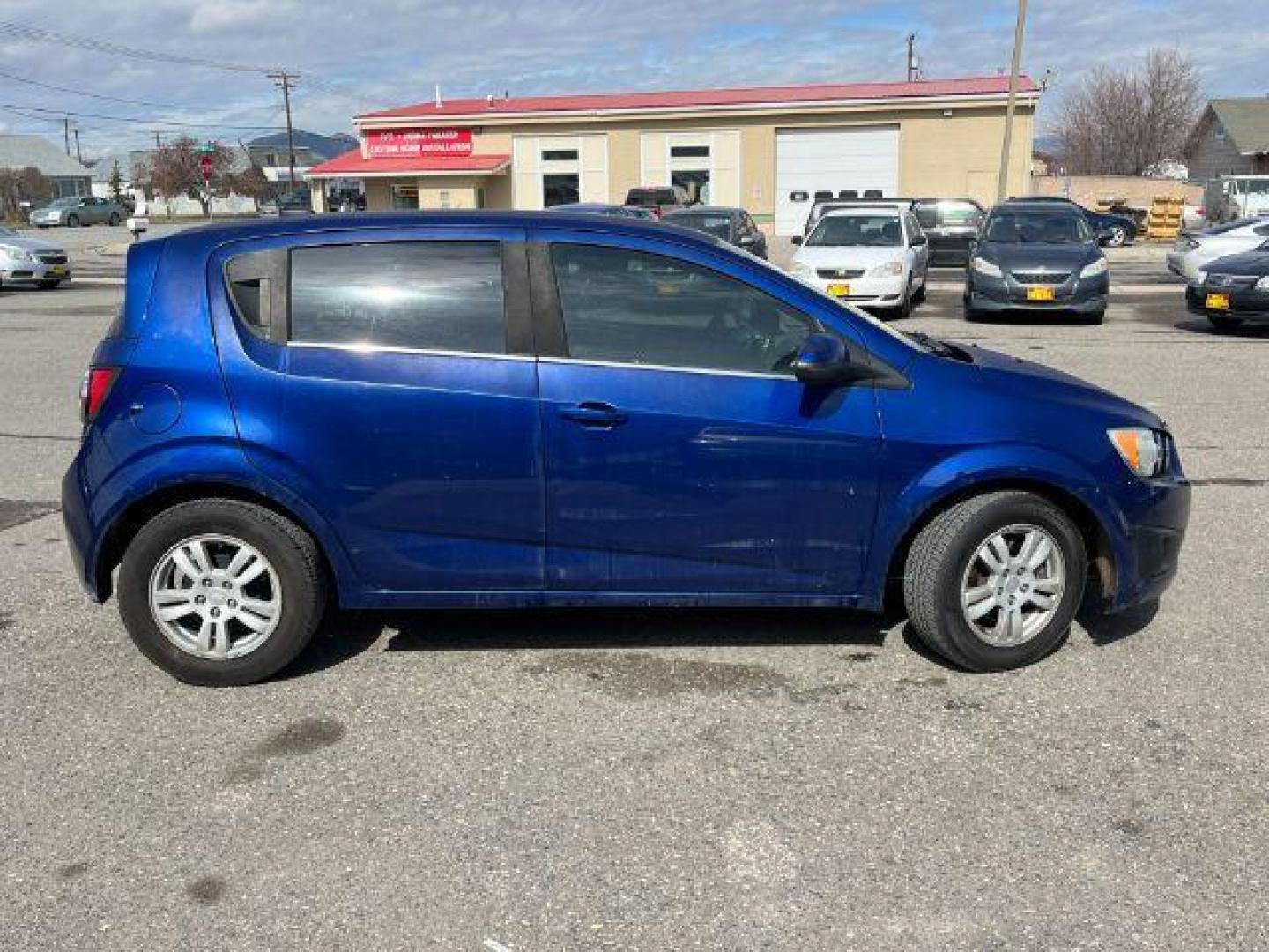 2014 Chevrolet Sonic LT Auto 5-Door (1G1JC6SG9E4) with an 1.8L L4 DOHC 24V engine, 6-Speed Automatic transmission, located at 1821 N Montana Ave., Helena, MT, 59601, 46.603447, -112.022781 - Photo#3