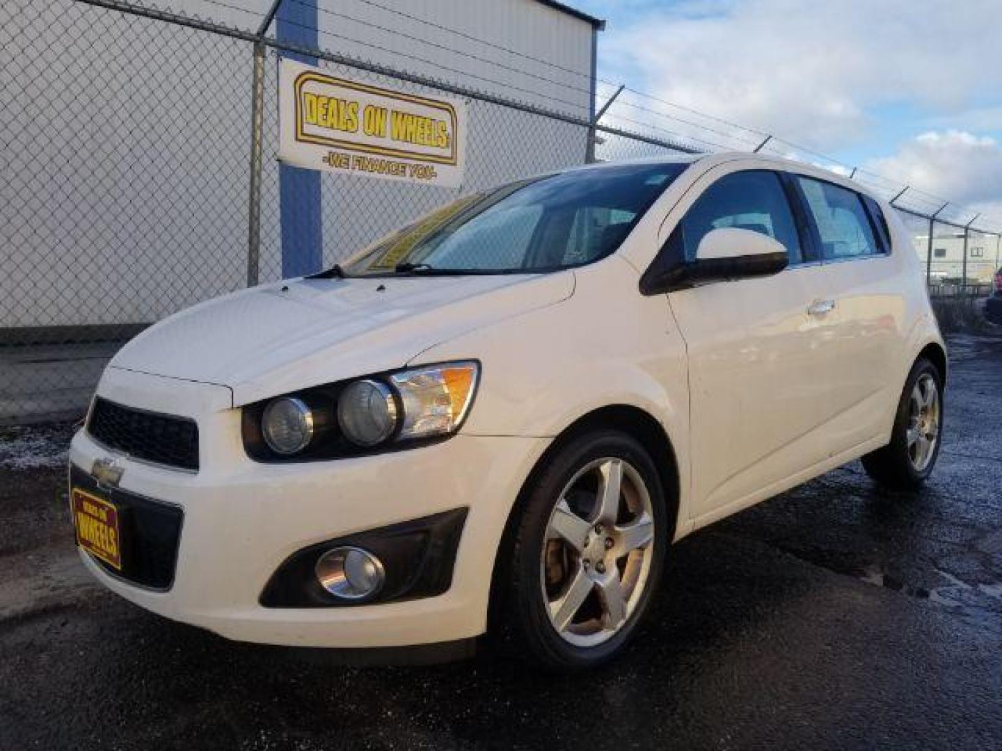 2014 Chevrolet Sonic LTZ Auto 5-Door (1G1JE6SB2E4) with an 1.4L L4 DOHC 24V TURBO engine, 6-Speed Automatic transmission, located at 4801 10th Ave S,, Great Falls, MT, 59405, 47.494347, -111.229942 - Photo#0