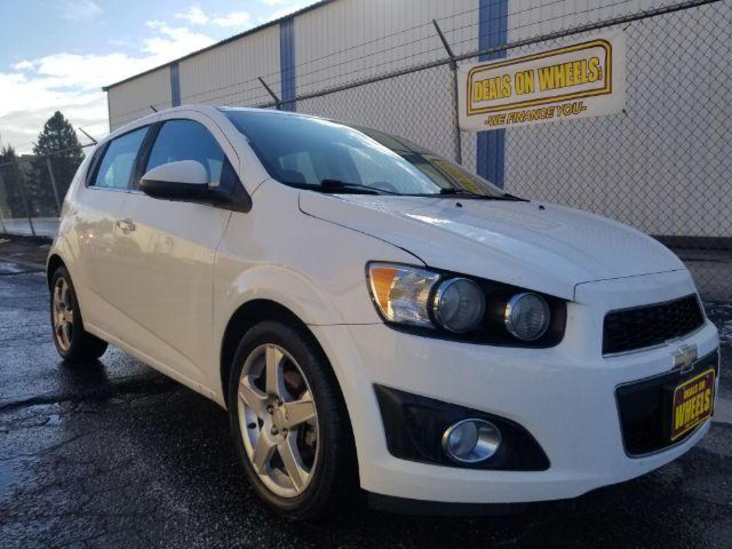 2014 Chevrolet Sonic LTZ Auto 5-Door (1G1JE6SB2E4) with an 1.4L L4 DOHC 24V TURBO engine, 6-Speed Automatic transmission, located at 4801 10th Ave S,, Great Falls, MT, 59405, 47.494347, -111.229942 - Photo#2