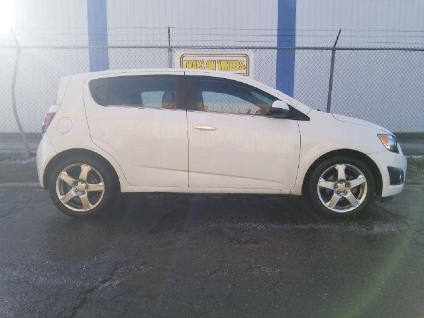 2014 Chevrolet Sonic LTZ Auto 5-Door (1G1JE6SB2E4) with an 1.4L L4 DOHC 24V TURBO engine, 6-Speed Automatic transmission, located at 4801 10th Ave S,, Great Falls, MT, 59405, 47.494347, -111.229942 - Photo#3