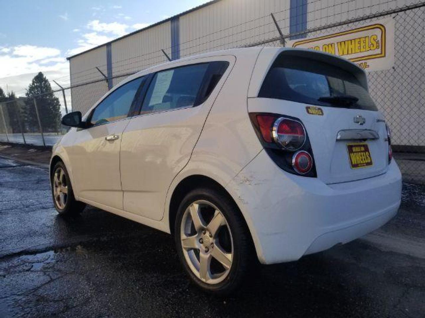 2014 Chevrolet Sonic LTZ Auto 5-Door (1G1JE6SB2E4) with an 1.4L L4 DOHC 24V TURBO engine, 6-Speed Automatic transmission, located at 4801 10th Ave S,, Great Falls, MT, 59405, 47.494347, -111.229942 - Photo#5