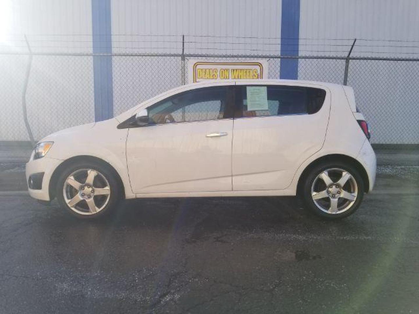 2014 Chevrolet Sonic LTZ Auto 5-Door (1G1JE6SB2E4) with an 1.4L L4 DOHC 24V TURBO engine, 6-Speed Automatic transmission, located at 4801 10th Ave S,, Great Falls, MT, 59405, 47.494347, -111.229942 - Photo#6