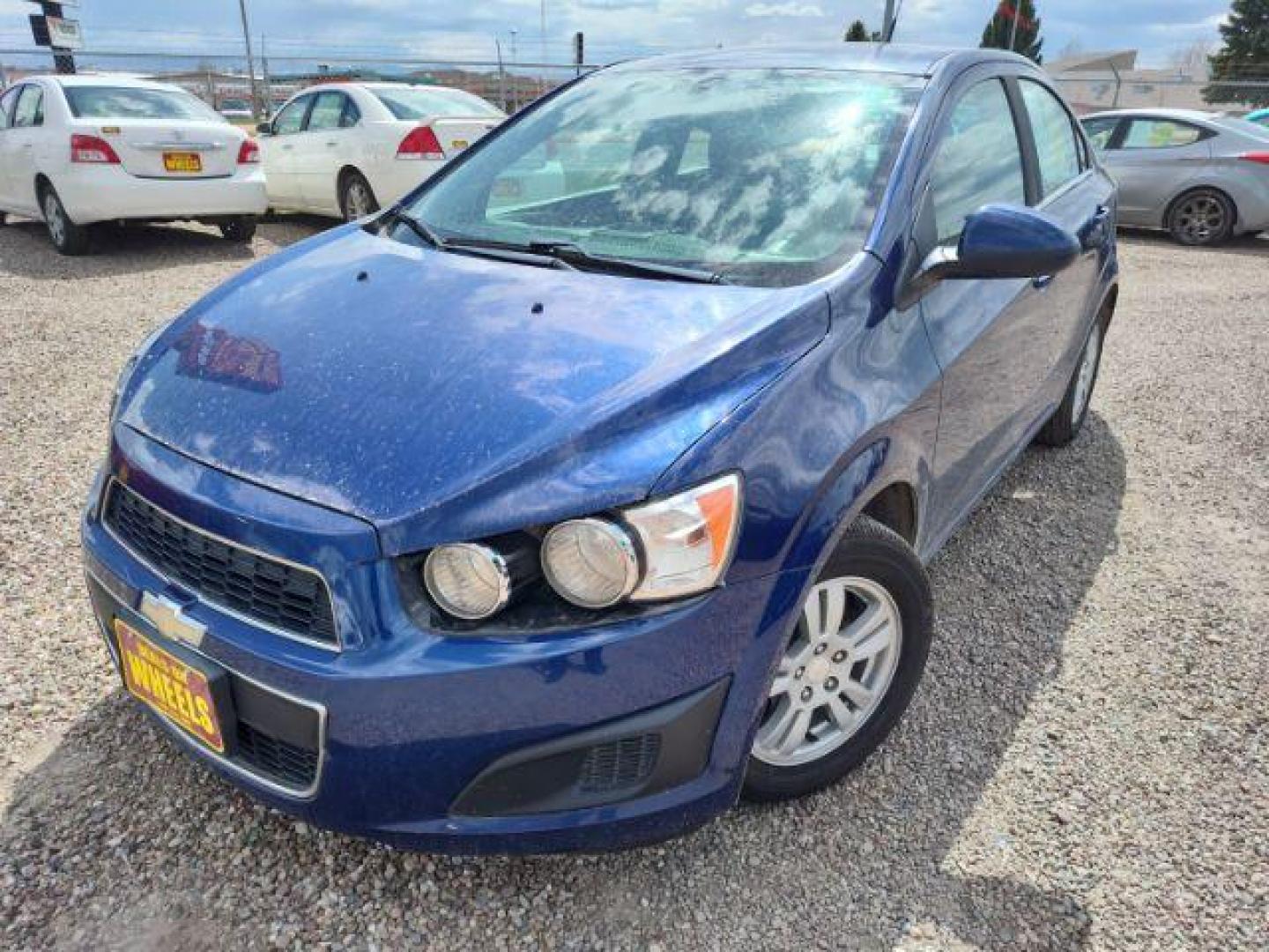 2014 Chevrolet Sonic LT Auto Sedan (1G1JC5SH6E4) with an 1.8L L4 DOHC 24V engine, 6-Speed Automatic transmission, located at 4801 10th Ave S,, Great Falls, MT, 59405, 47.494347, -111.229942 - Photo#0