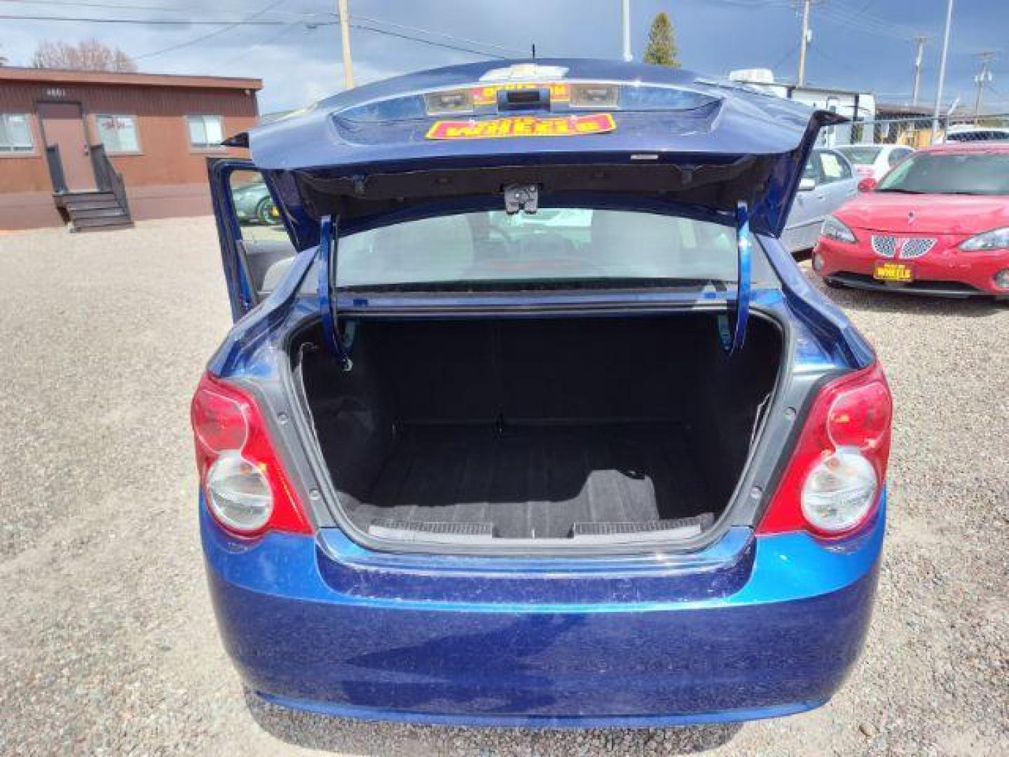 2014 Chevrolet Sonic LT Auto Sedan (1G1JC5SH6E4) with an 1.8L L4 DOHC 24V engine, 6-Speed Automatic transmission, located at 4801 10th Ave S,, Great Falls, MT, 59405, 47.494347, -111.229942 - Photo#12