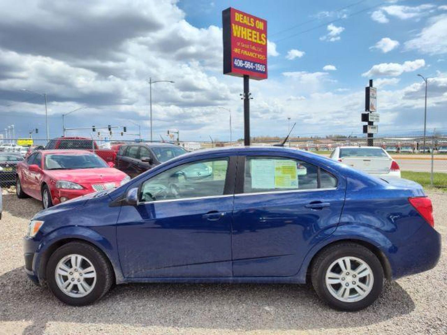 2014 Chevrolet Sonic LT Auto Sedan (1G1JC5SH6E4) with an 1.8L L4 DOHC 24V engine, 6-Speed Automatic transmission, located at 4801 10th Ave S,, Great Falls, MT, 59405, 47.494347, -111.229942 - Photo#1