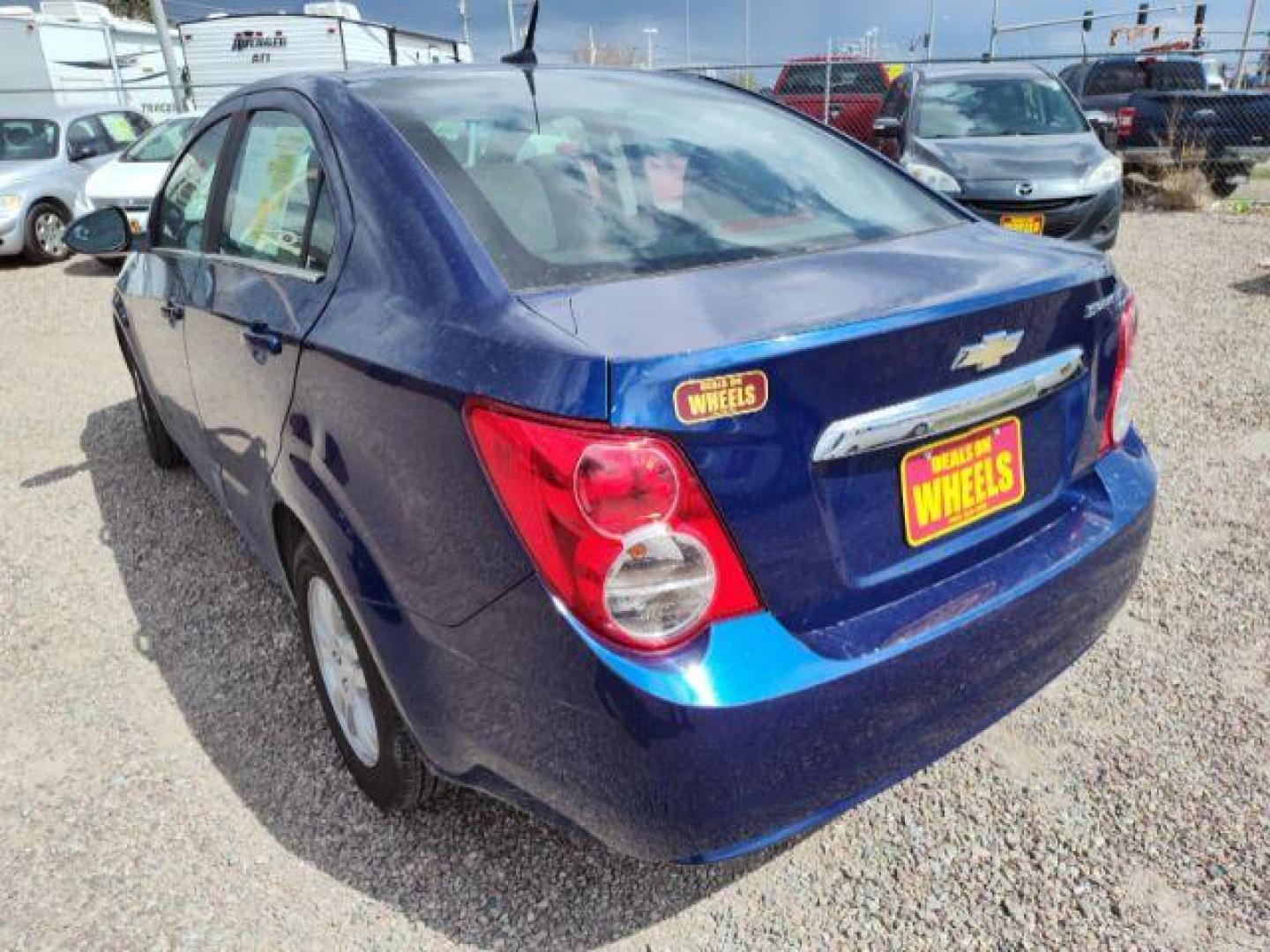 2014 Chevrolet Sonic LT Auto Sedan (1G1JC5SH6E4) with an 1.8L L4 DOHC 24V engine, 6-Speed Automatic transmission, located at 4801 10th Ave S,, Great Falls, MT, 59405, 47.494347, -111.229942 - Photo#2