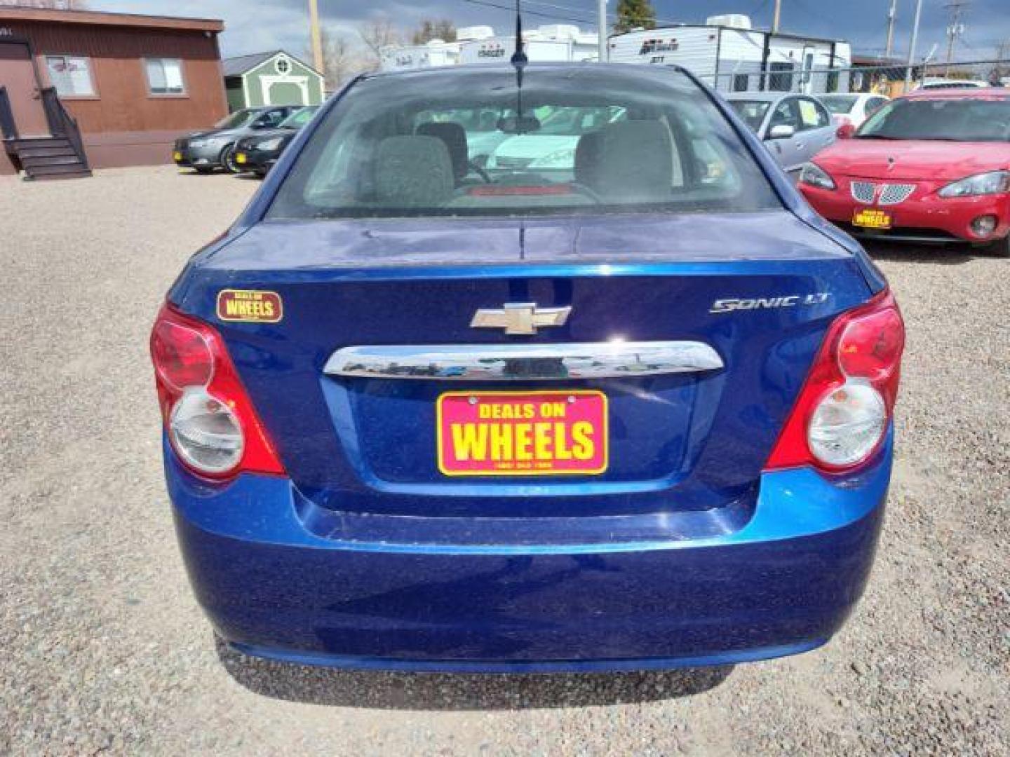 2014 Chevrolet Sonic LT Auto Sedan (1G1JC5SH6E4) with an 1.8L L4 DOHC 24V engine, 6-Speed Automatic transmission, located at 4801 10th Ave S,, Great Falls, MT, 59405, 47.494347, -111.229942 - Photo#3