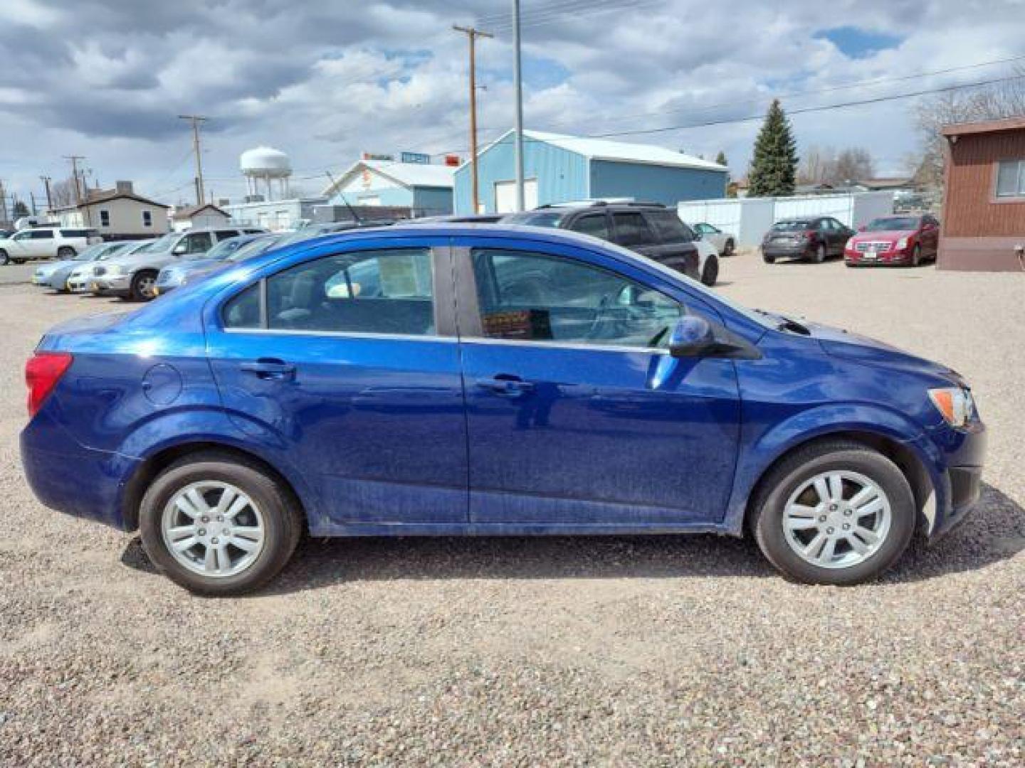 2014 Chevrolet Sonic LT Auto Sedan (1G1JC5SH6E4) with an 1.8L L4 DOHC 24V engine, 6-Speed Automatic transmission, located at 4801 10th Ave S,, Great Falls, MT, 59405, 47.494347, -111.229942 - Photo#5