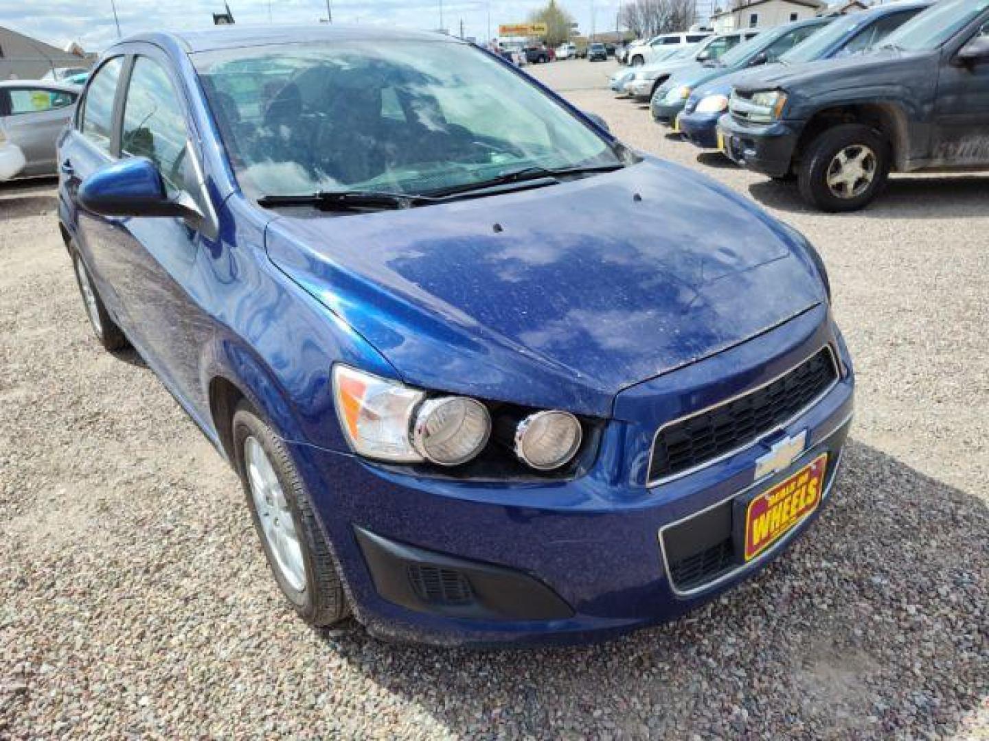 2014 Chevrolet Sonic LT Auto Sedan (1G1JC5SH6E4) with an 1.8L L4 DOHC 24V engine, 6-Speed Automatic transmission, located at 4801 10th Ave S,, Great Falls, MT, 59405, 47.494347, -111.229942 - Photo#6