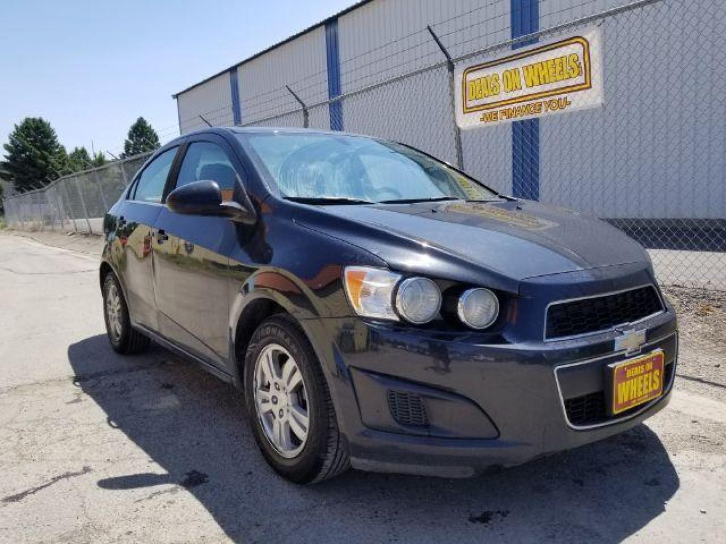 2014 Chevrolet Sonic LT Auto Sedan (1G1JC5SH7E4) with an 1.8L L4 DOHC 24V engine, 6-Speed Automatic transmission, located at 1821 N Montana Ave., Helena, MT, 59601, 46.603447, -112.022781 - Photo#10