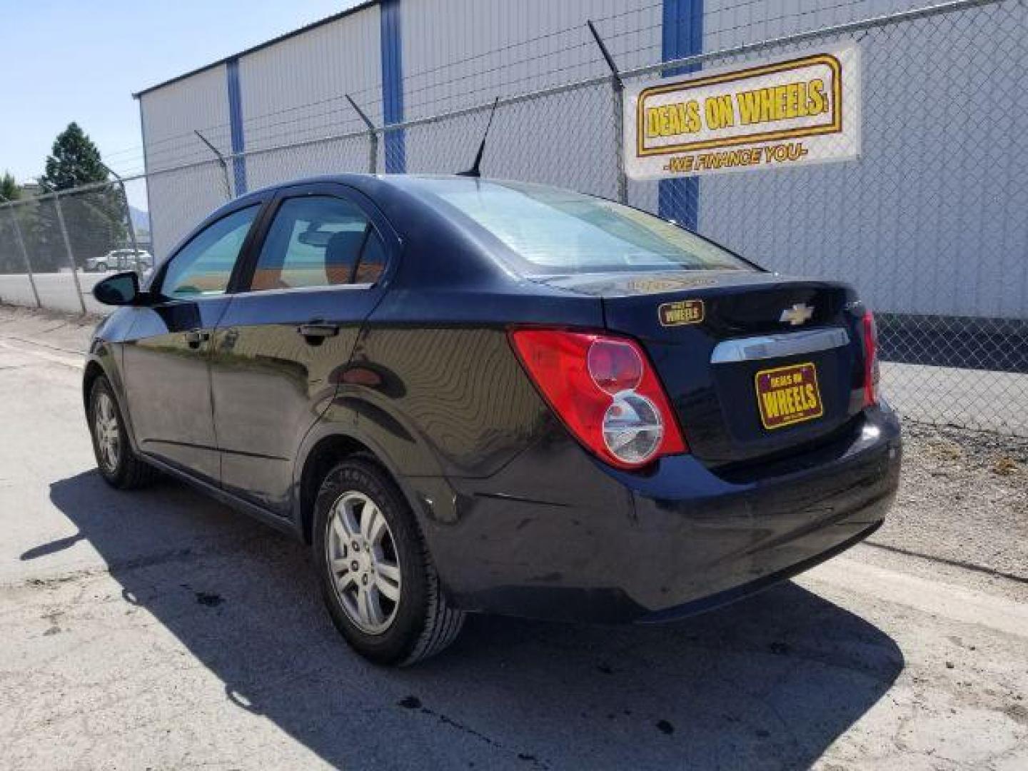 2014 Chevrolet Sonic LT Auto Sedan (1G1JC5SH7E4) with an 1.8L L4 DOHC 24V engine, 6-Speed Automatic transmission, located at 1821 N Montana Ave., Helena, MT, 59601, 46.603447, -112.022781 - Photo#13