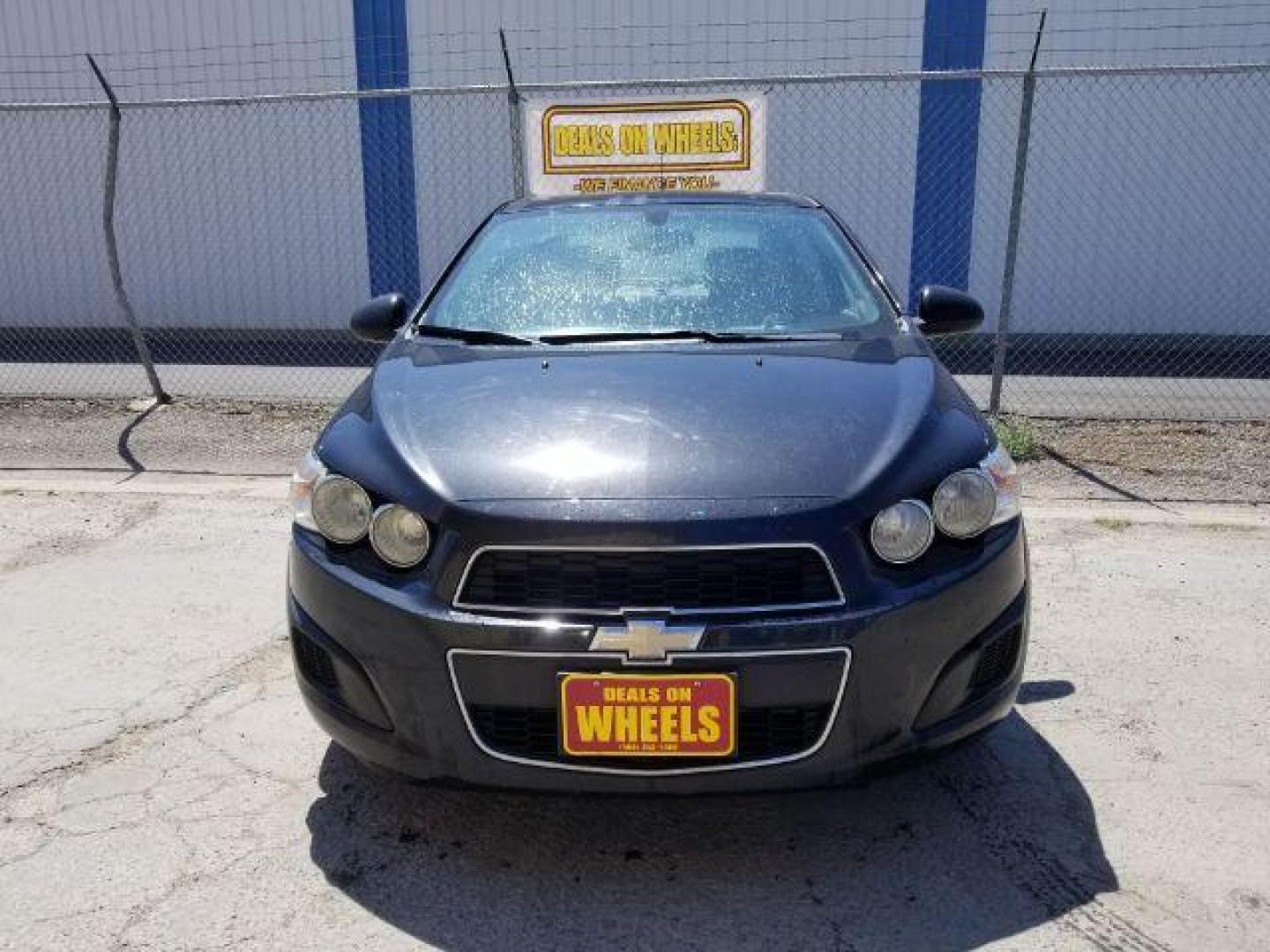 2014 Chevrolet Sonic LT Auto Sedan (1G1JC5SH7E4) with an 1.8L L4 DOHC 24V engine, 6-Speed Automatic transmission, located at 1821 N Montana Ave., Helena, MT, 59601, 46.603447, -112.022781 - Photo#2