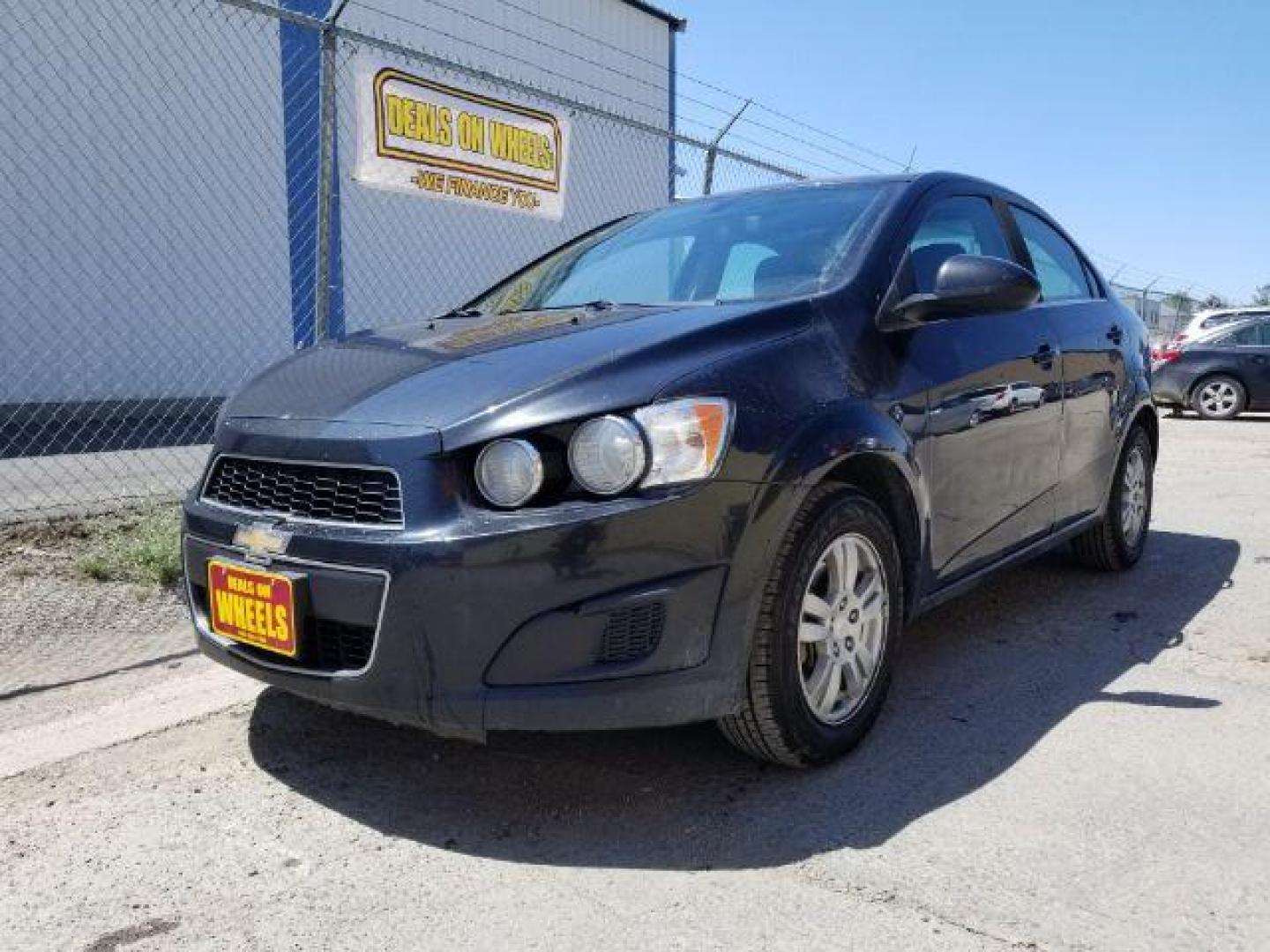 2014 Chevrolet Sonic LT Auto Sedan (1G1JC5SH7E4) with an 1.8L L4 DOHC 24V engine, 6-Speed Automatic transmission, located at 1821 N Montana Ave., Helena, MT, 59601, 46.603447, -112.022781 - Photo#0