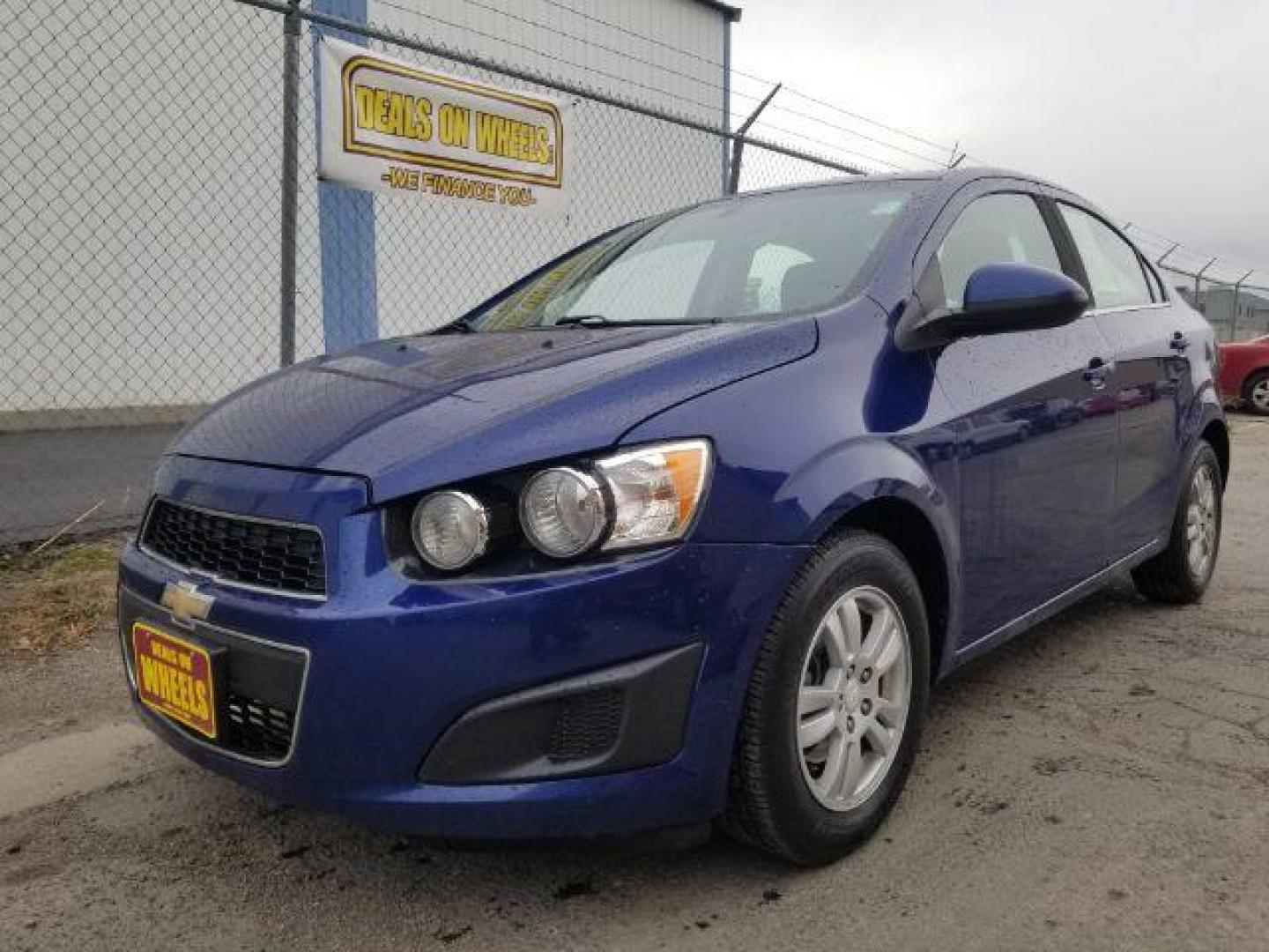 2014 Chevrolet Sonic LT Auto Sedan (1G1JC5SH7E4) with an 1.8L L4 DOHC 24V engine, 6-Speed Automatic transmission, located at 601 E. Idaho St., Kalispell, MT, 59901, 48.203983, -114.308662 - Photo#0