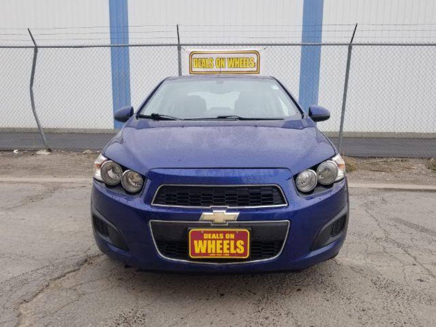 2014 Chevrolet Sonic LT Auto Sedan (1G1JC5SH7E4) with an 1.8L L4 DOHC 24V engine, 6-Speed Automatic transmission, located at 601 E. Idaho St., Kalispell, MT, 59901, 48.203983, -114.308662 - Photo#1