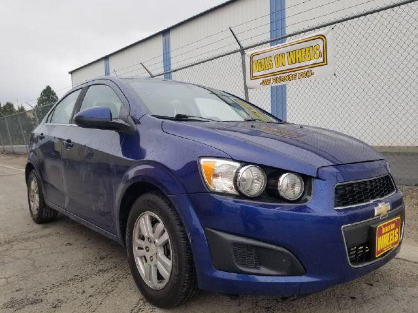 2014 Chevrolet Sonic LT Auto Sedan (1G1JC5SH7E4) with an 1.8L L4 DOHC 24V engine, 6-Speed Automatic transmission, located at 601 E. Idaho St., Kalispell, MT, 59901, 48.203983, -114.308662 - Photo#2