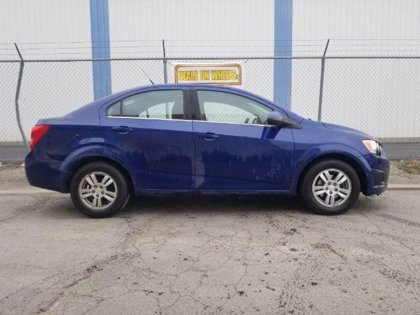 2014 Chevrolet Sonic LT Auto Sedan (1G1JC5SH7E4) with an 1.8L L4 DOHC 24V engine, 6-Speed Automatic transmission, located at 601 E. Idaho St., Kalispell, MT, 59901, 48.203983, -114.308662 - Photo#3